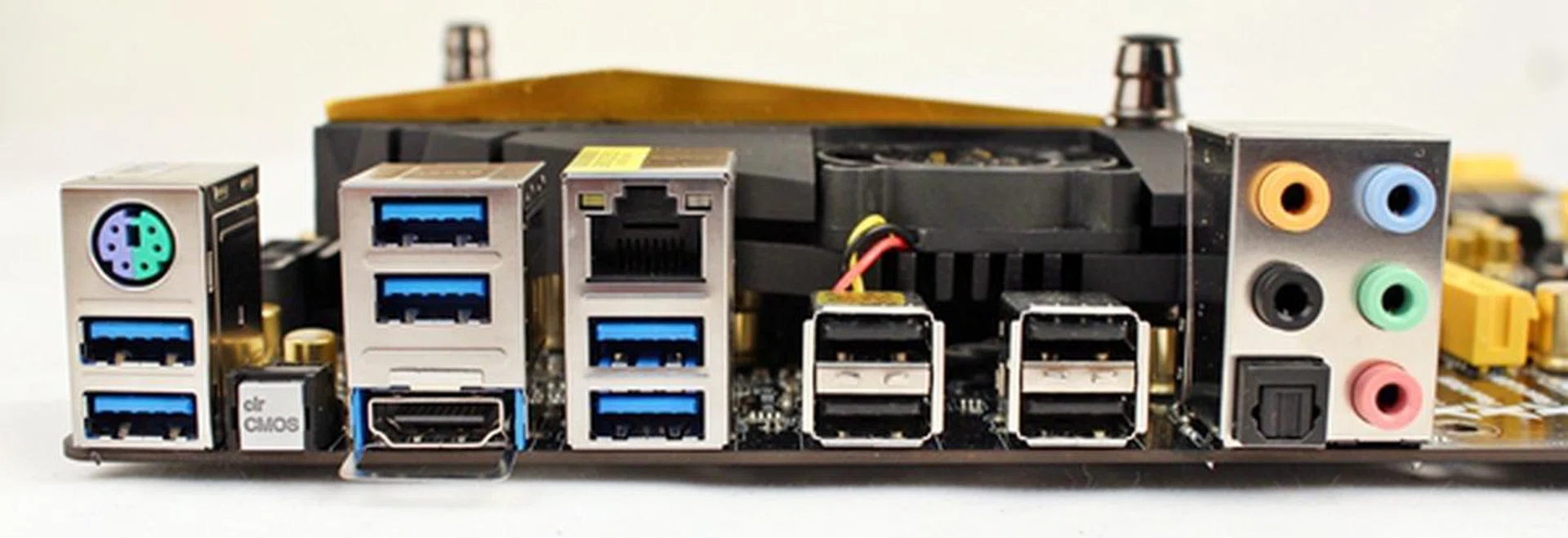 The clear CMOS button is nested between the two rear ports stacks to keep it out of reach on purpose.