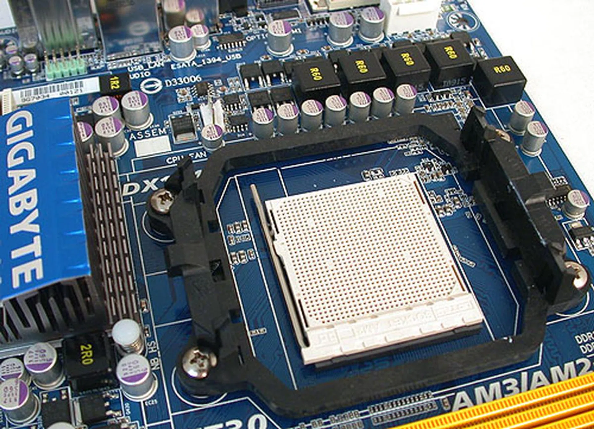A very typical arrangement around the CPU socket, with only solid capacitors accepted.