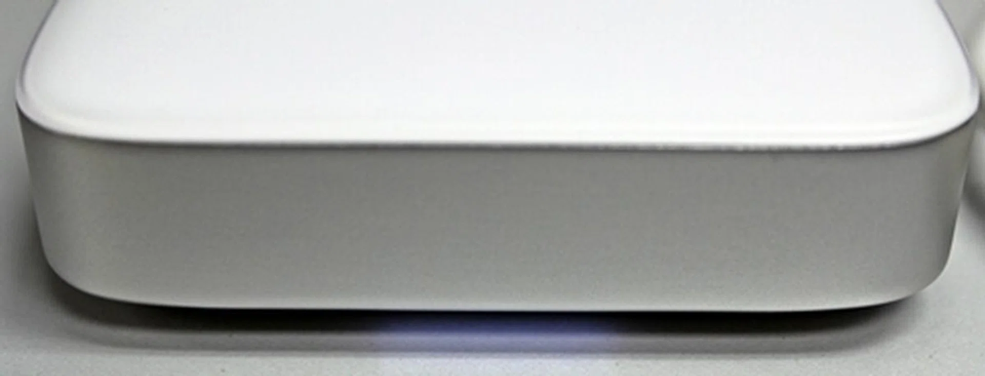 The LED glows unobtrusively from its underbelly, indicating the drive is in operation.