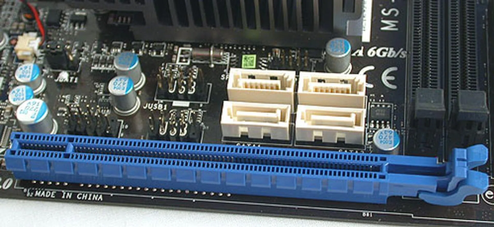 The standard four SATA 6Gbps ports are located right besides the PCIe 2.0 slot, similar to where Gigabyte has placed them too. 
