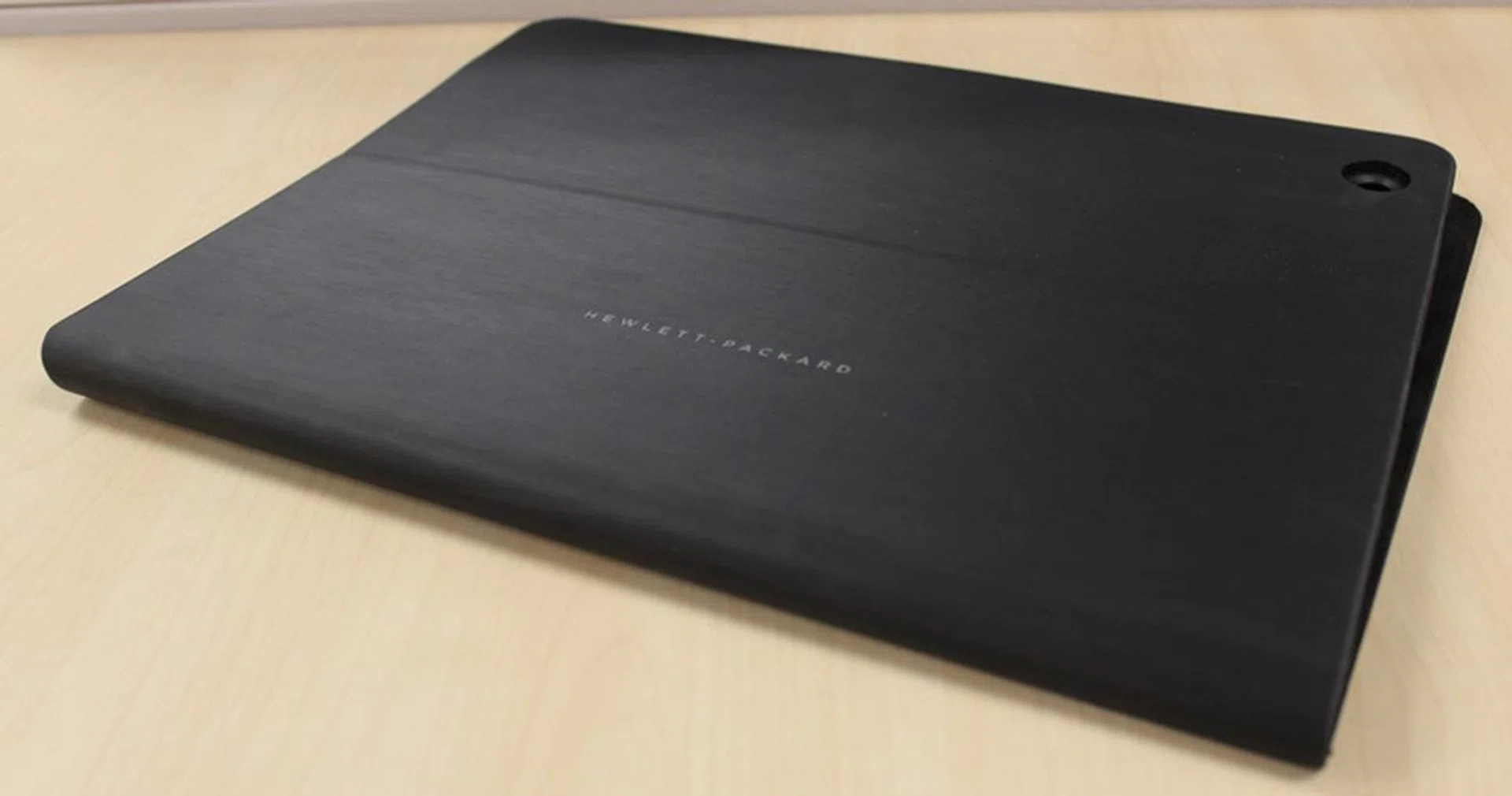 The HP Pro Slate 12 Paper Folio doesn't come with the HP Pro Slate 12. You'll need to purchase it for $129 if you want it.