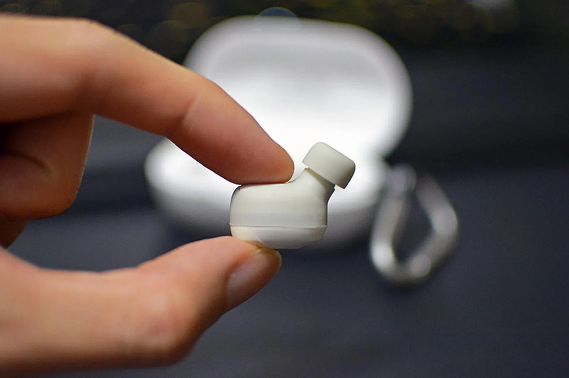 The earbuds are sort of squarish, which fit in my ear surprisingly well. 