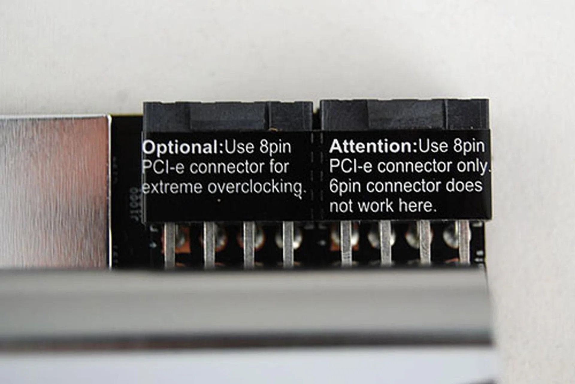 The ATX 24-pin power connector with the two USB 2.0 headers and the front panel connectors.