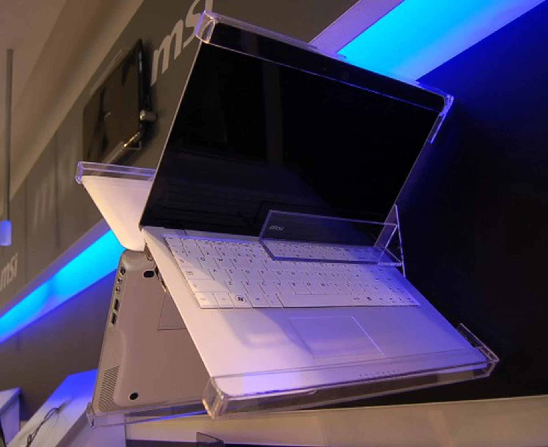  Here's a closer look at two of them nicely forming an X. The X-Slim series will be available in three main models, the X320, X340 and the X340 Pro. All will be physically identical sporting a 13-inch WXGA screen (1366x768), come with a 4-cell battery and weigh 1.3kg. The difference would be that the X320 would be the more mobile version using the Intel Atom Z530 1.6GHz processor, the newer Intel Poulsbo US15W chipset with GMA500 graphics and will have a 3.5G (HSDPA) radio embedded.  
