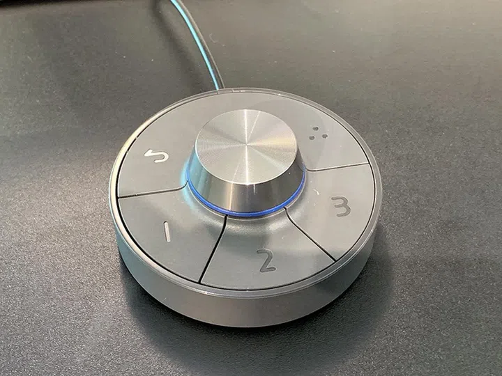 The hotkey puck lets you map three frequently used monitor settings to it so that you don't have to fiddle with the buttons on the back of the monitor like a drunk.