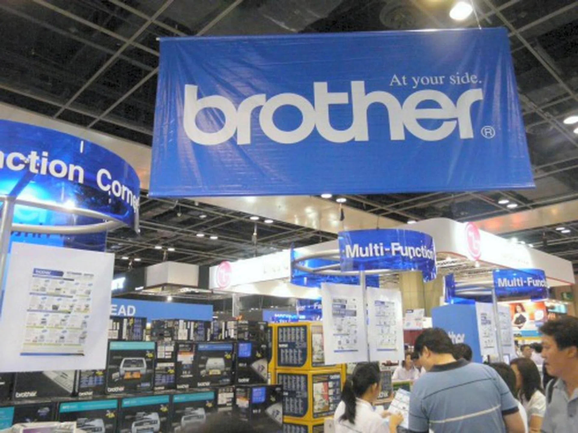  The familiar blue banner of Brother points the way to its booth located on Level Four. As you're probably familiar with Brother's products, let's just say you can't go wrong with the wide variety of printers that Brother has for all your home and office needs.  
