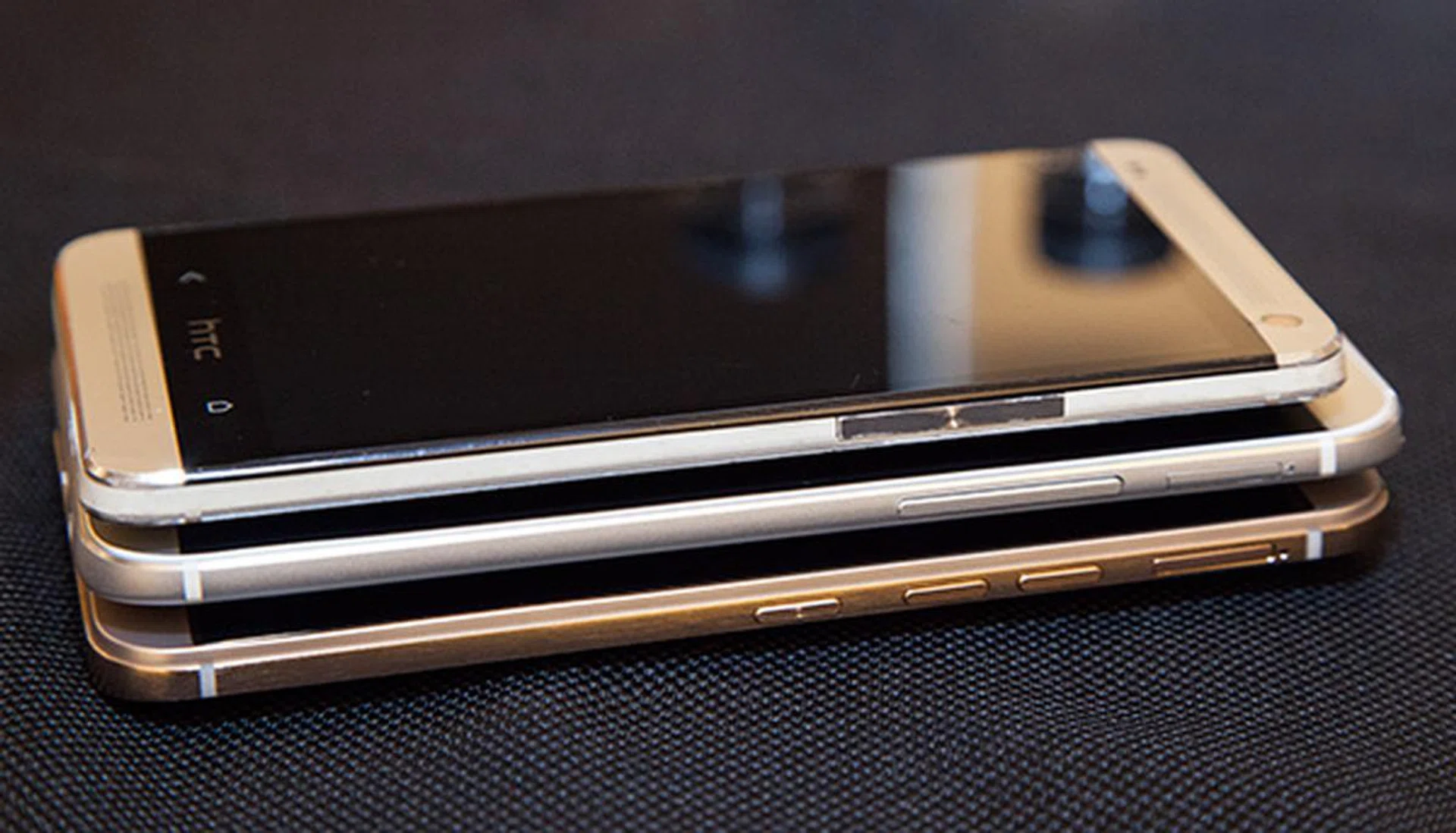 You can see the location and evolution of the buttons on the right flank of the phone starting with the HTC One M7 (on top) to the HTC One M8 (in the middle) and the latest HTC One M9 (at the bottom).