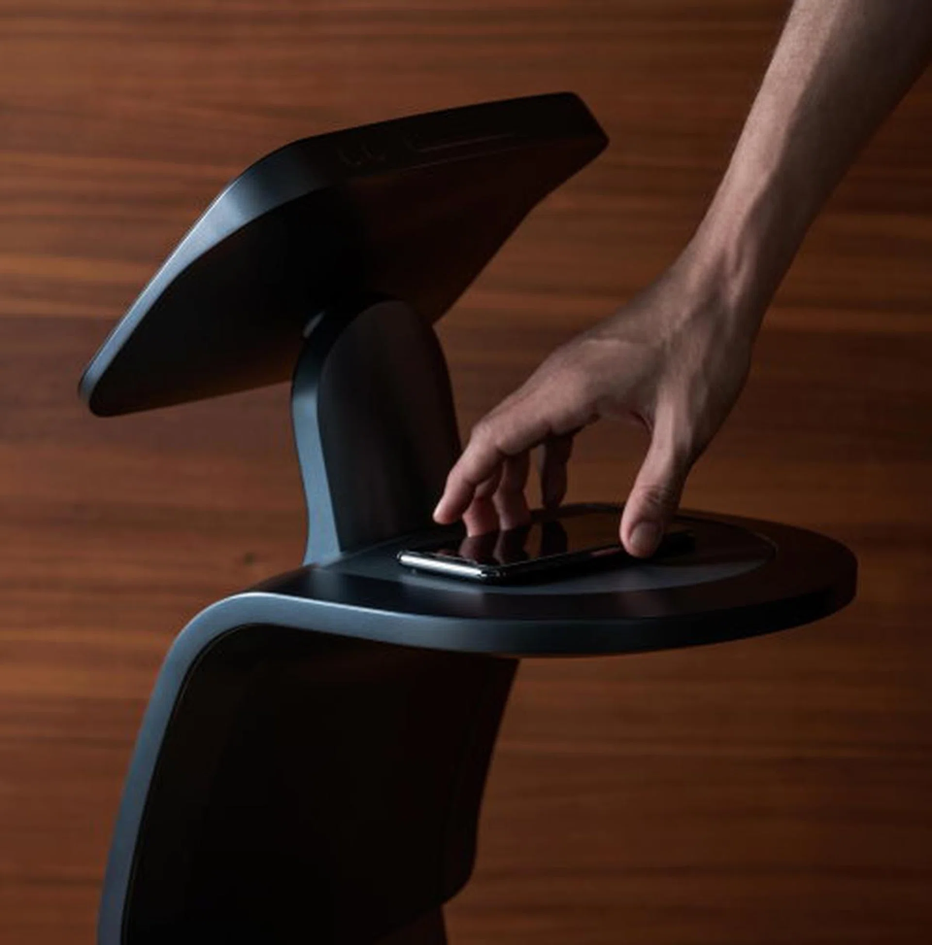Wireless charging shelf at the back can also be used like a regular shelf for temi to carry around your personal belongings. (Image: temi USA)