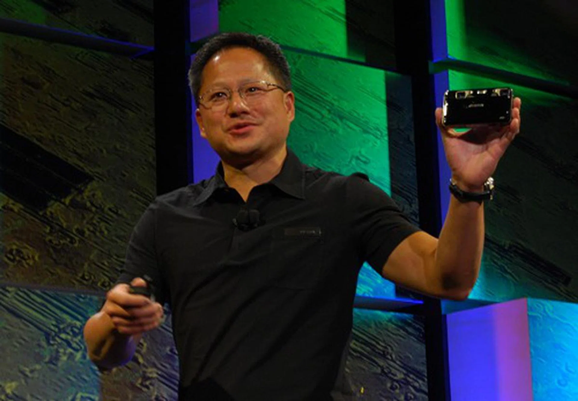 Jen-Hsun showing off the first 3D Vision certified camera from Fujifilm that captures 3D photos and videos - the FinePix Real 3D W1.