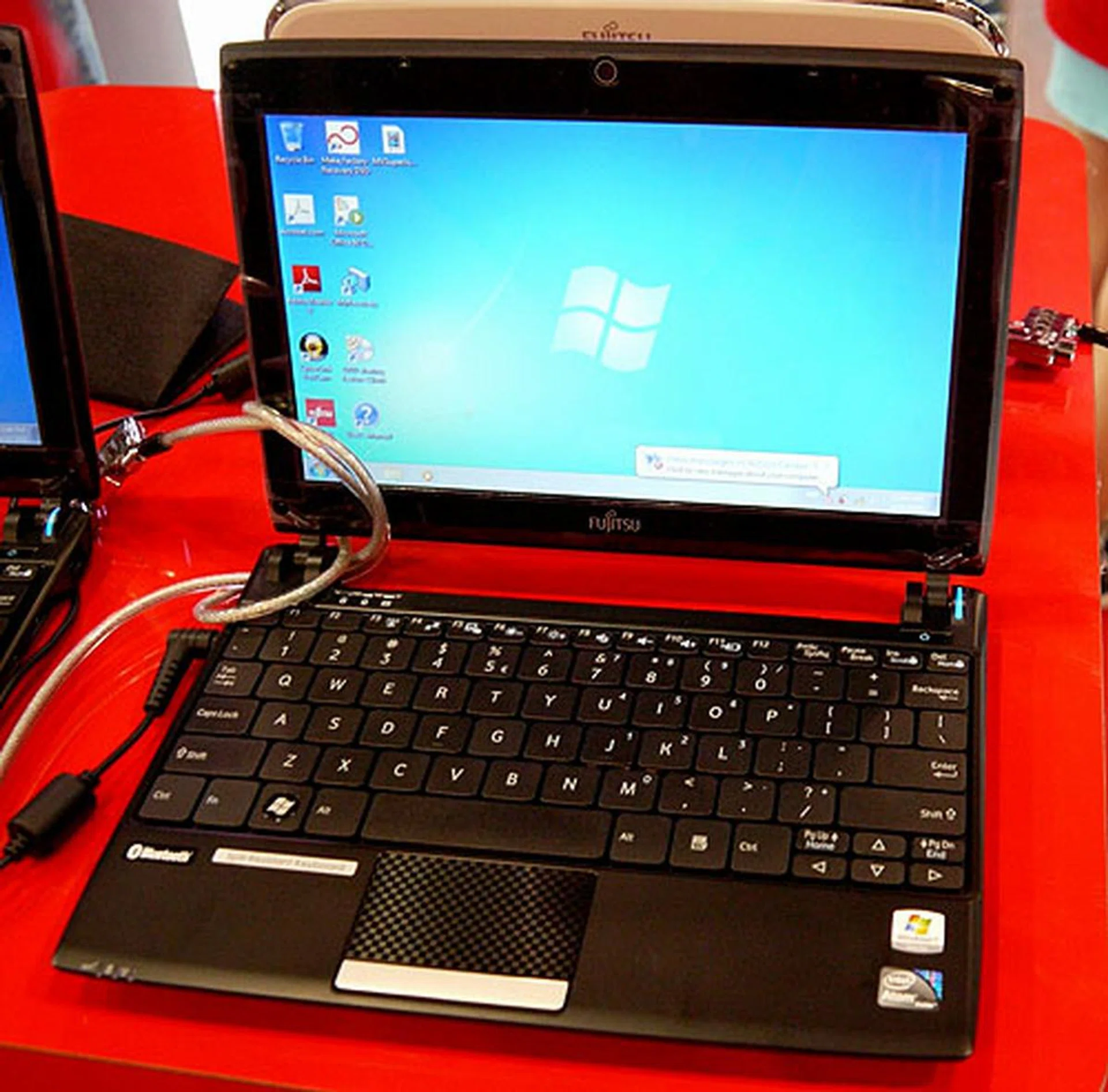 And this is the Lifebook MH330, which is a 10.1-inch netbook using the Intel Atom N450 processor with 1GB of memory. This unit weighs around 1.1kg with a battery life of up to 3 hours. It is going for $499 at the PC Show.