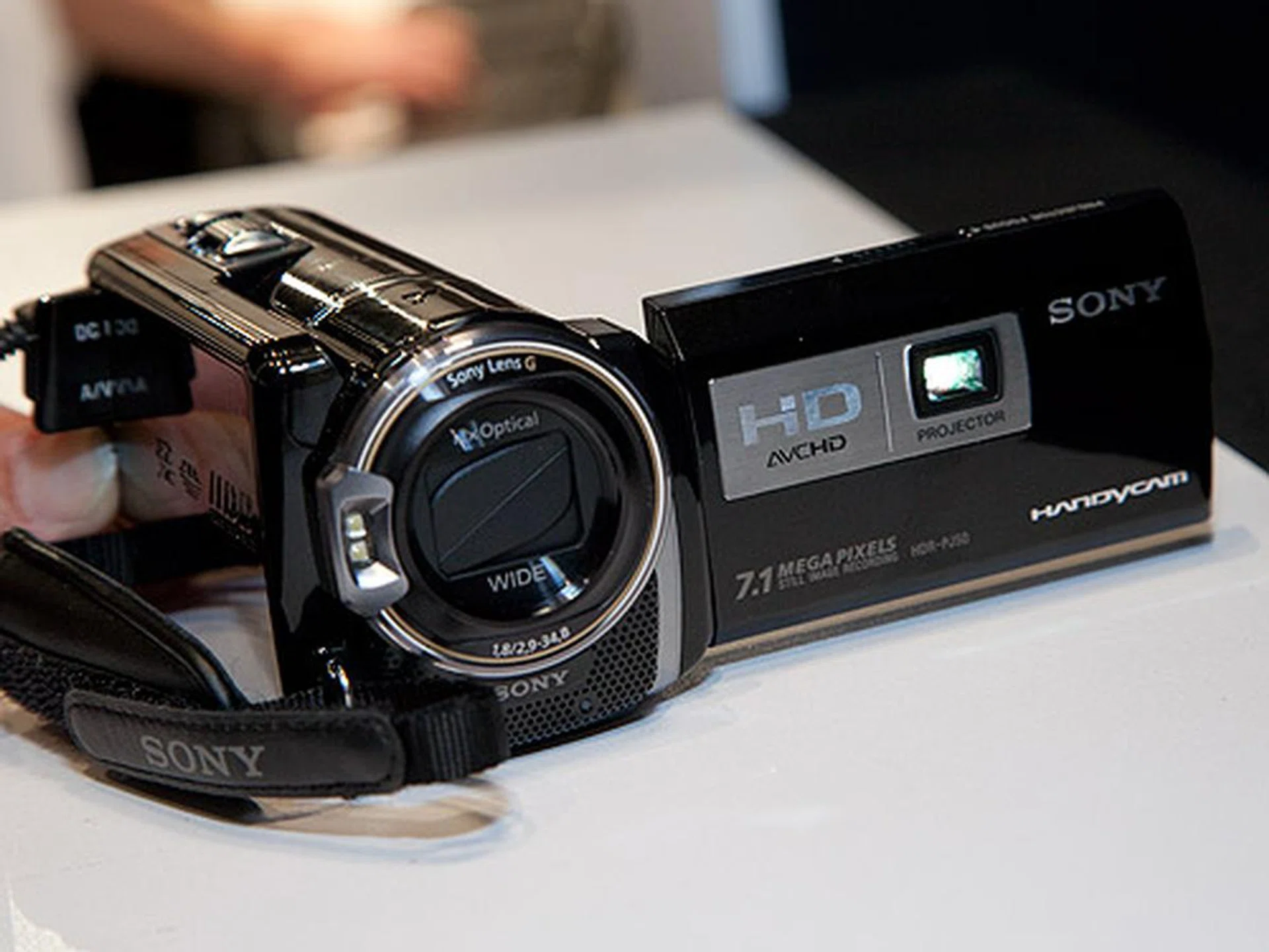 The Sony HDR-PJ50V comes with a built-in projector which lets you project your recorded videos on a screen or wall. It comes with 1920 x 1080 Full HD 60p recording, 220GB HDD, wide angle G lens, "Exmor R" CMOS sensor, 42x extended zoom and a 3.0" touch screen.