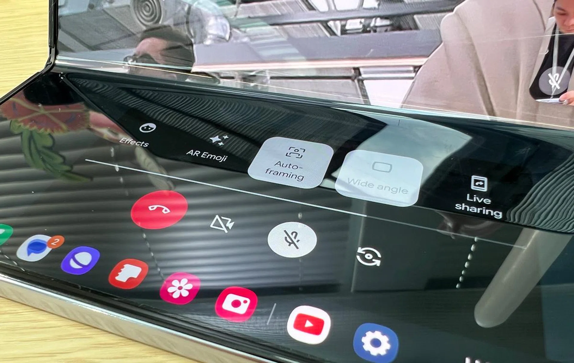 Trying out Auto Framing in a videocall, an important feature for busy professionals using the Fold5.