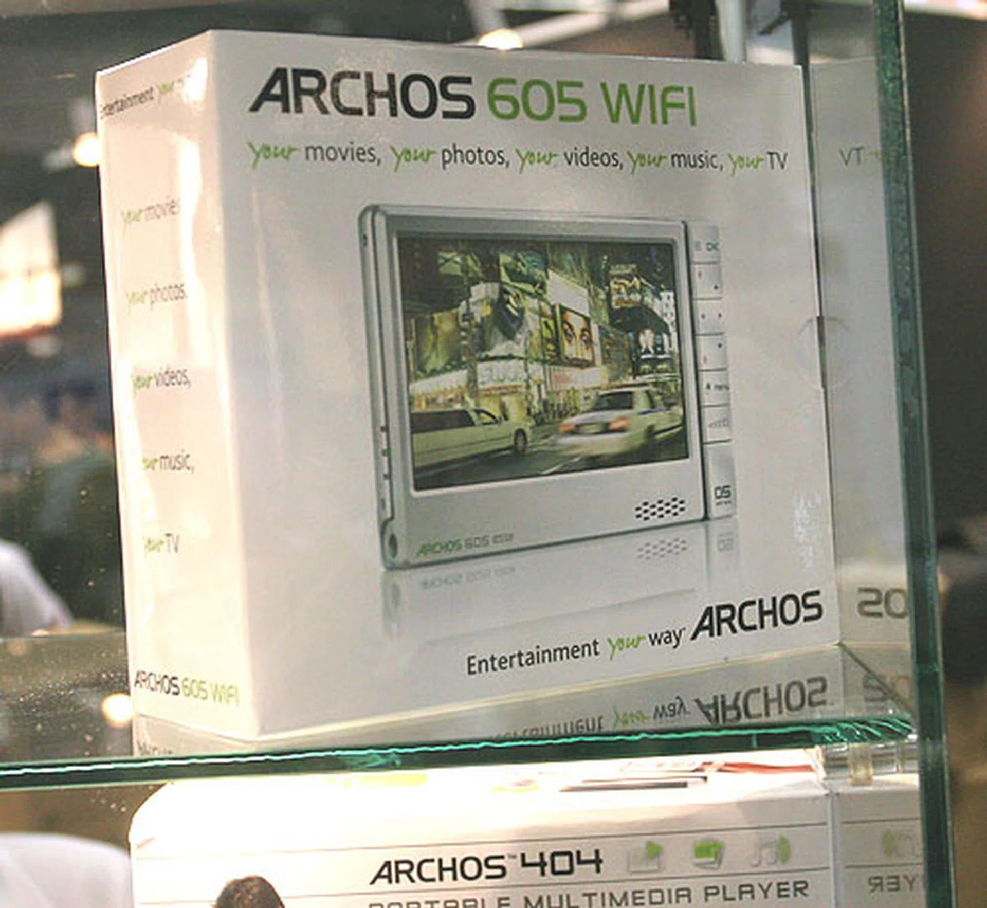  One of Archos latest product, the 605 WiFi comes in 30/80/160GB of space and plays back videos, photos and music of many formats, including MPEG4, MPEG2, WMV, VOB and H.264. You can even stream files from a PC using its WiFi functionality. This model and other older ones are found at Memory World's booth at 6356.  