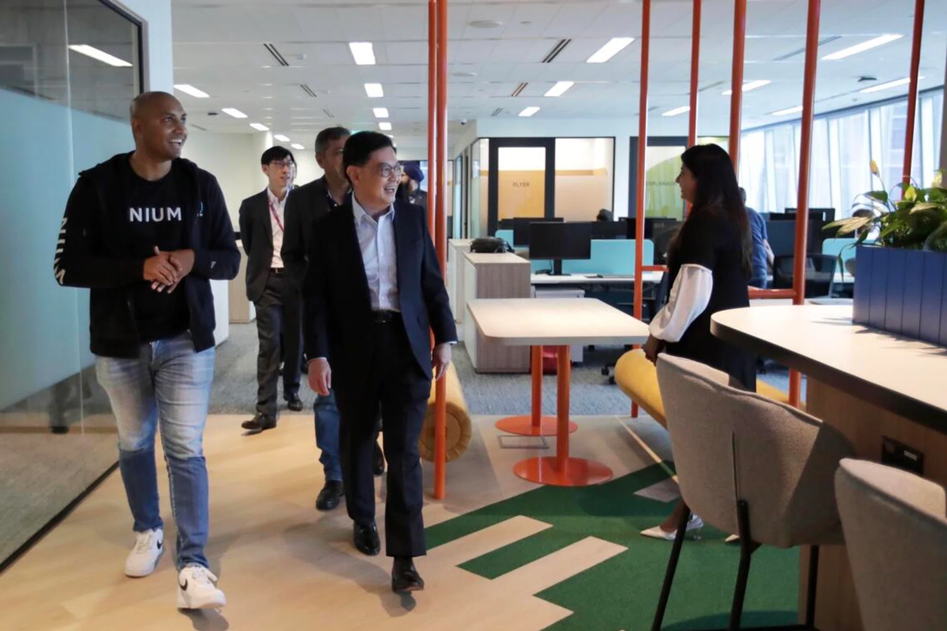 Deputy Prime Minister Heng Swee Keat, with Nium co-founder and chief executive Prajit Nanu, touring the company’s new headquarters at its official opening on July 3, 2023.