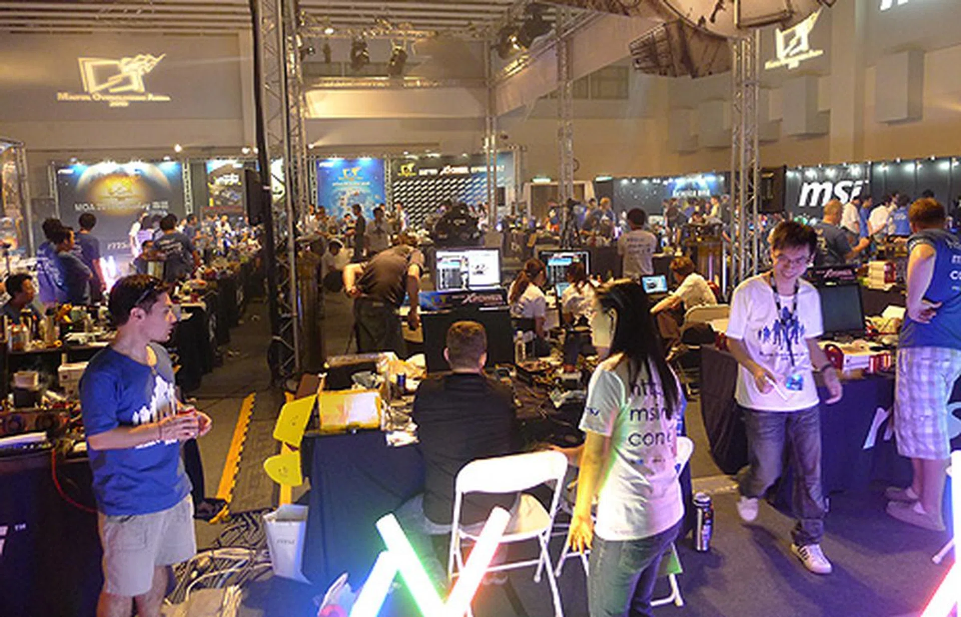 The competition hall is a flurry of mad activity as contestants race against the clock in attempts to post their best time.