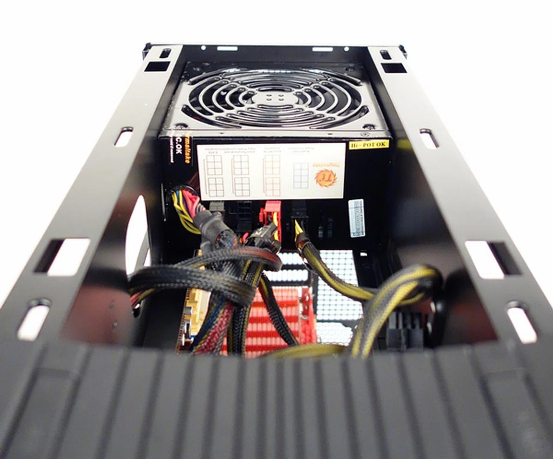 A view from the top where we see the power cables snaking their way to their intended components.