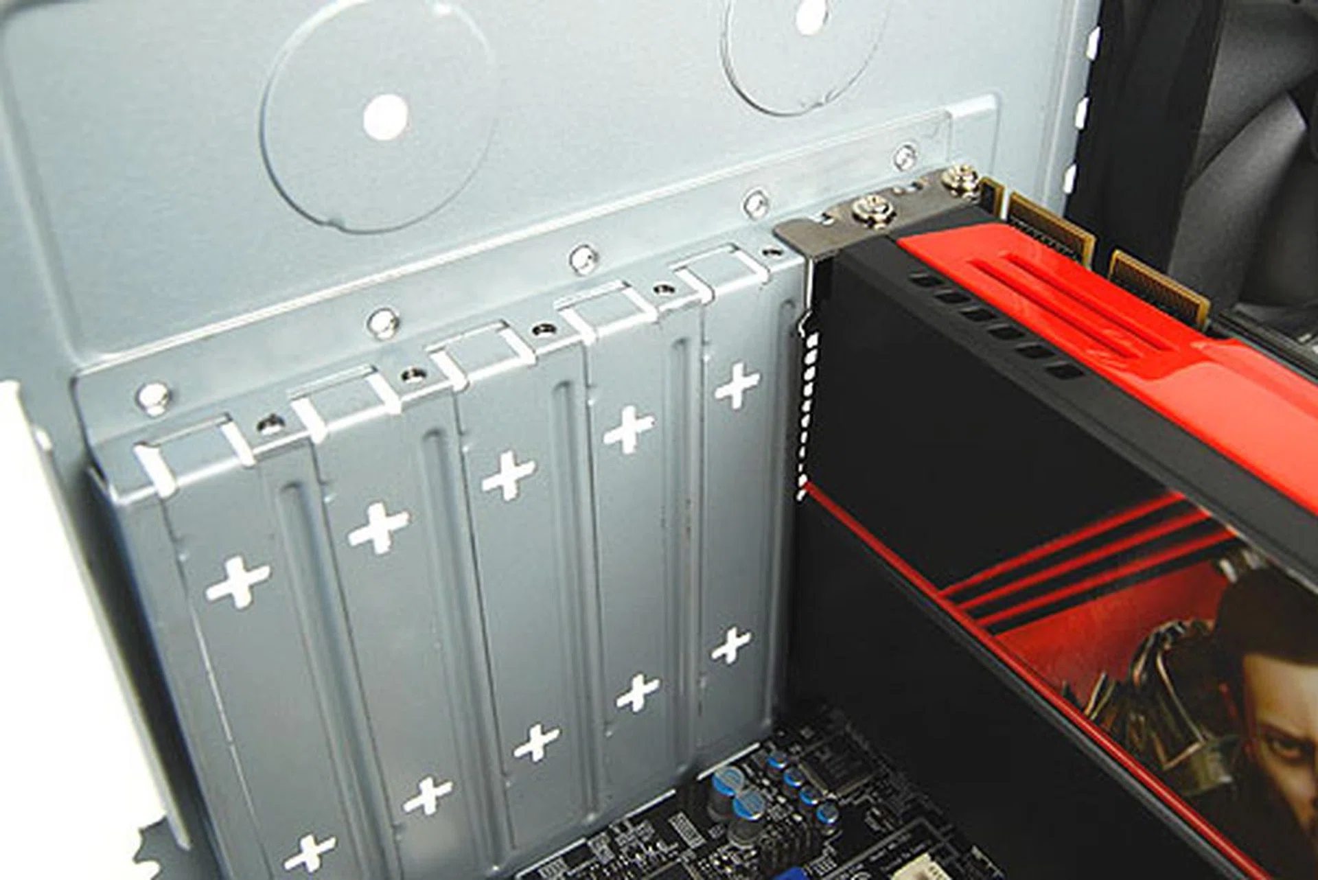 The seven expansion slots are old school stuff, and once you remove the back plate, there's no way of covering them up. The worst thing, however, is that the slots themselves didn't line up properly with our graphics card, making it a real chore trying to screw the graphics card in place.