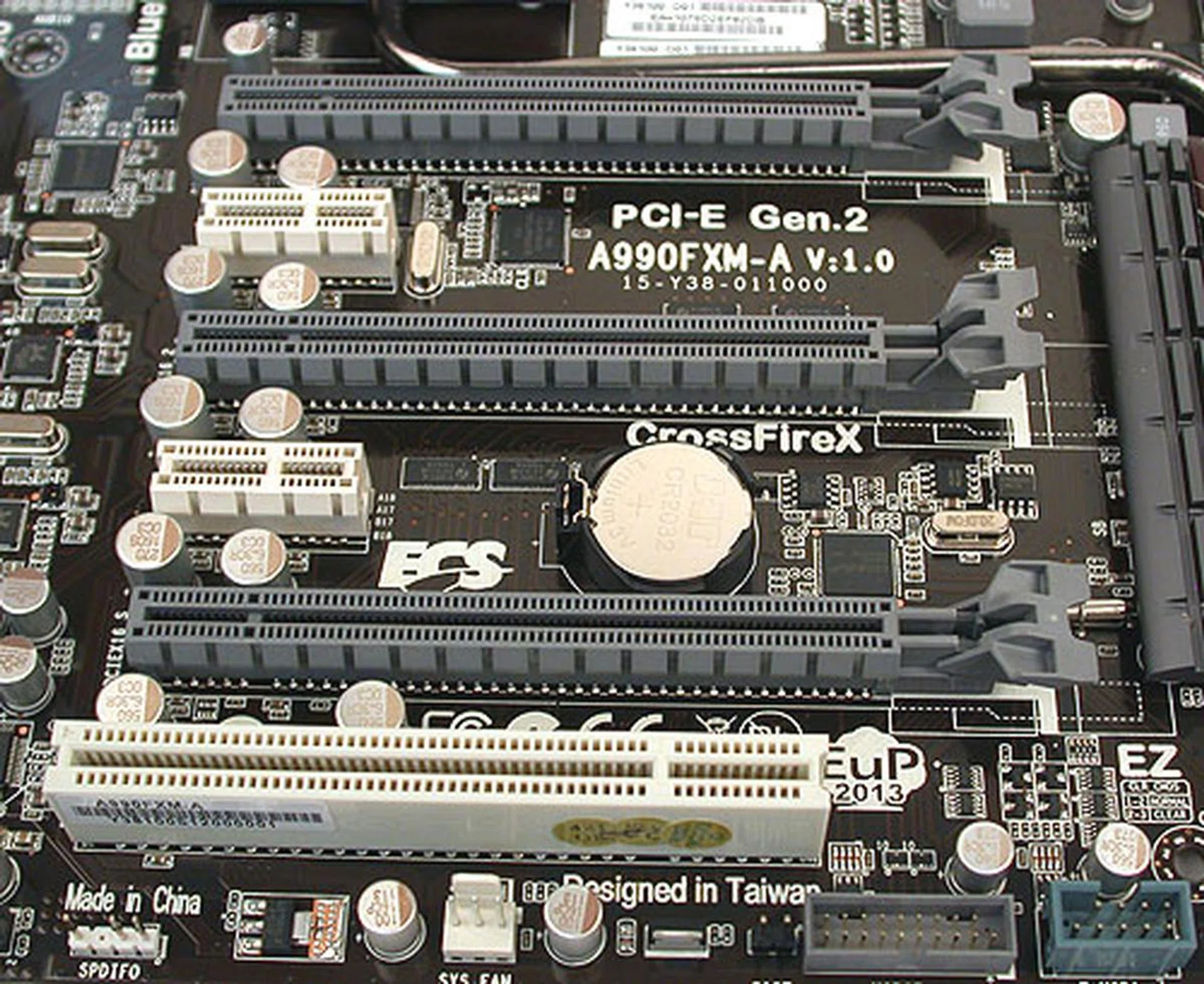 With just three PCIe 2.0 x16 slots, 3-way SLI or CrossFireX is the best you can get on the ECS. The slots are spaced out sufficiently to support dual-slot graphics cards. 