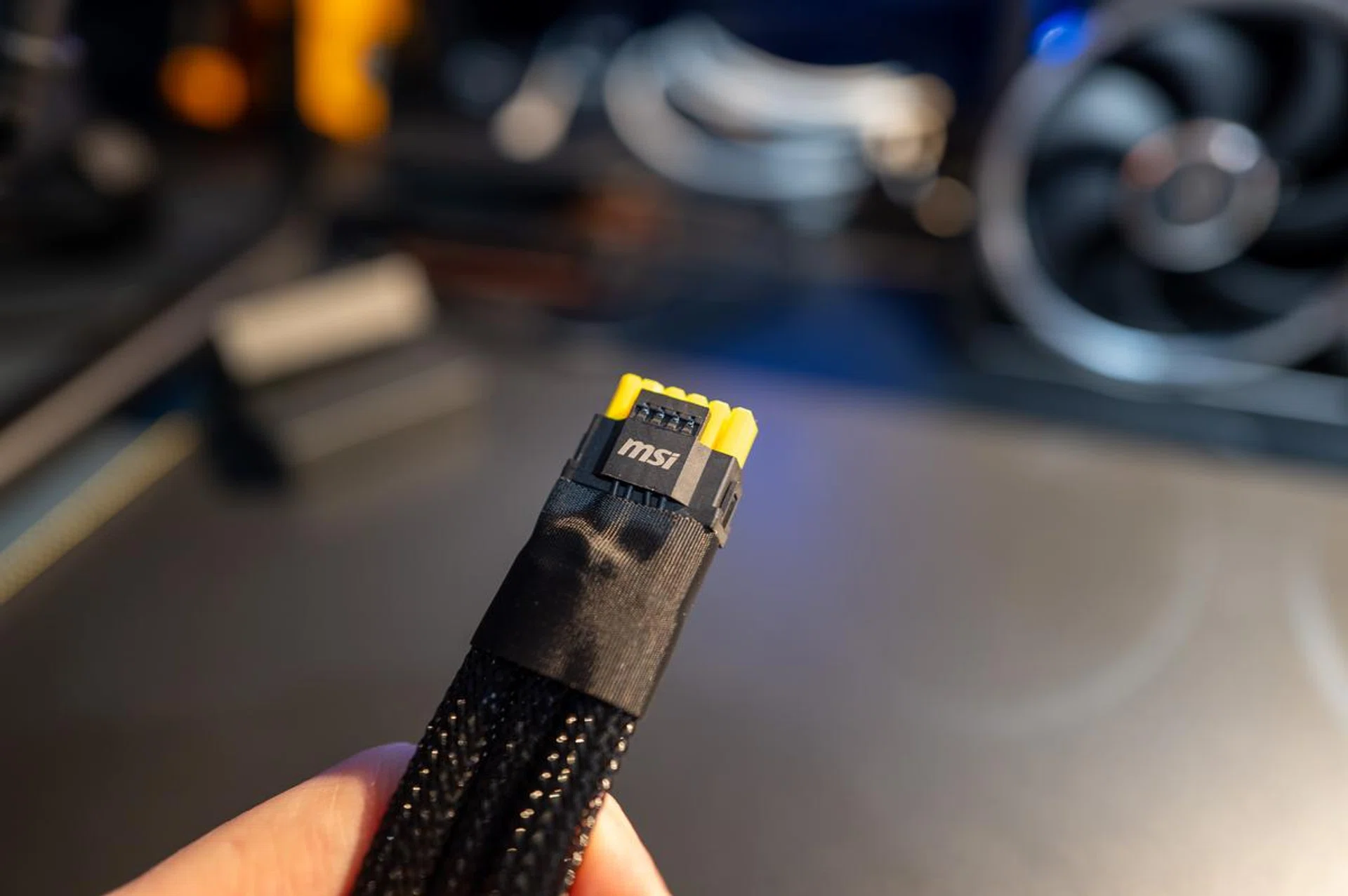 MSI has also thoughtfully included a yellow-tipped 16-pin power adapter that is designed to provide a visual guide, ensuring users fully insert the connectors into the GPU for safe operation. (Image: HWZ)