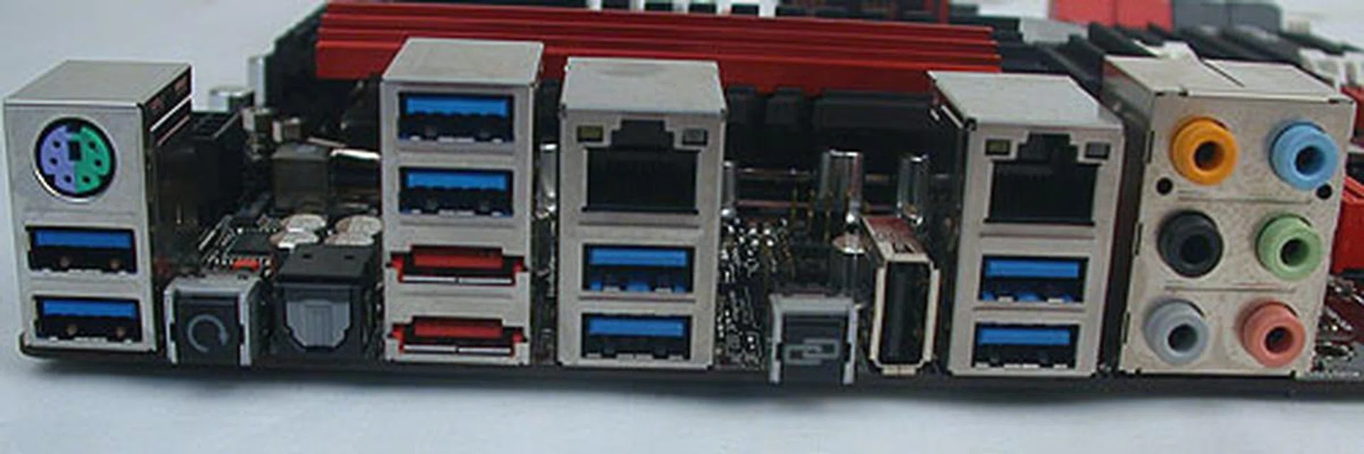 Besides the ROG Connect button (and USB port) that allows you to adjust the board's BIOS settings via another PC, you'll also find dual Gigabit LAN ports and a remarkable eight USB 3.0 ports (in blue). It does mean that there's no coaxial S/PDIF output but eSATA ports are still present. 
