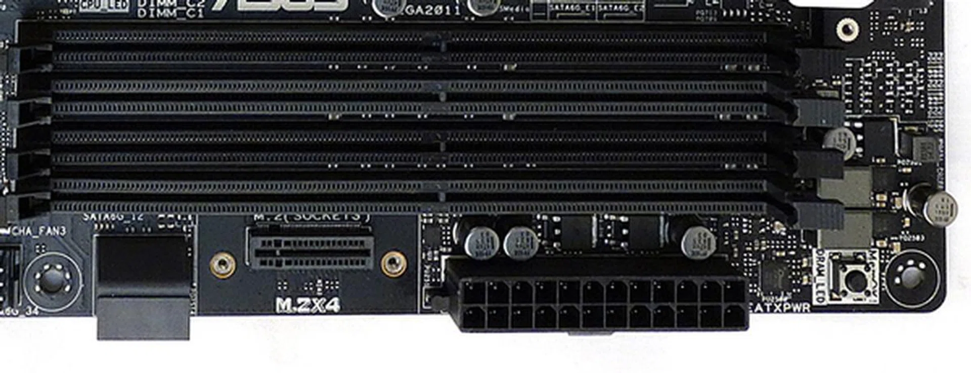 The M.2 socket, the 24-pin power connector, and the MemOK! button are located along this front edge of the board.