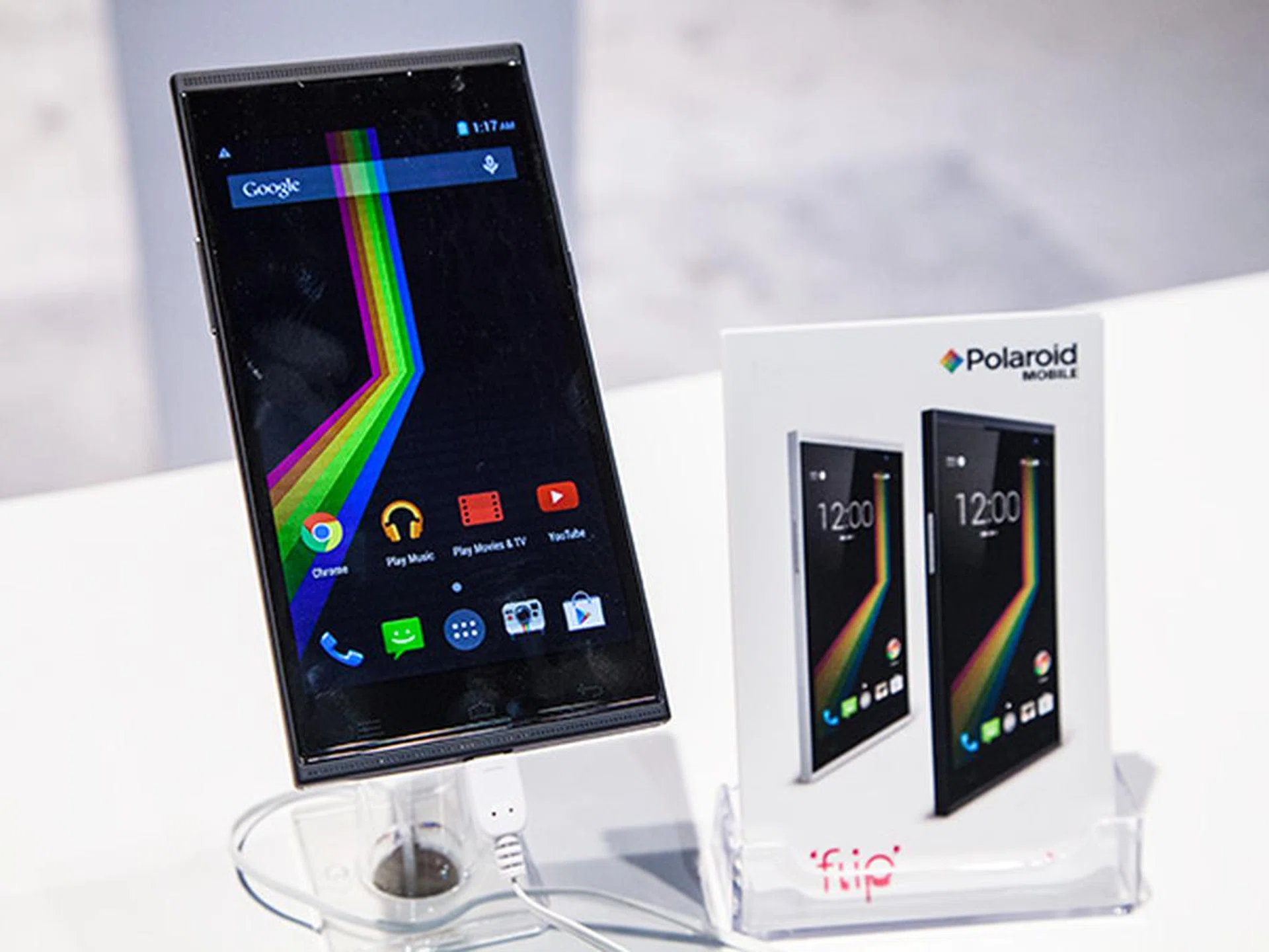 What?! Polaroid is actually making smartphones now? We're looking here at the new Polaroid Flip that is an Android 5.0 Lollipop phone equipped with a quad-core processor. It features a 5.5-inch IPS display and an 8MP camera. The expected retail price for an unlocked phone without contract is US$149. Besides the Flip, Polaroid also introduced two other models known as the Snap and Selfie.