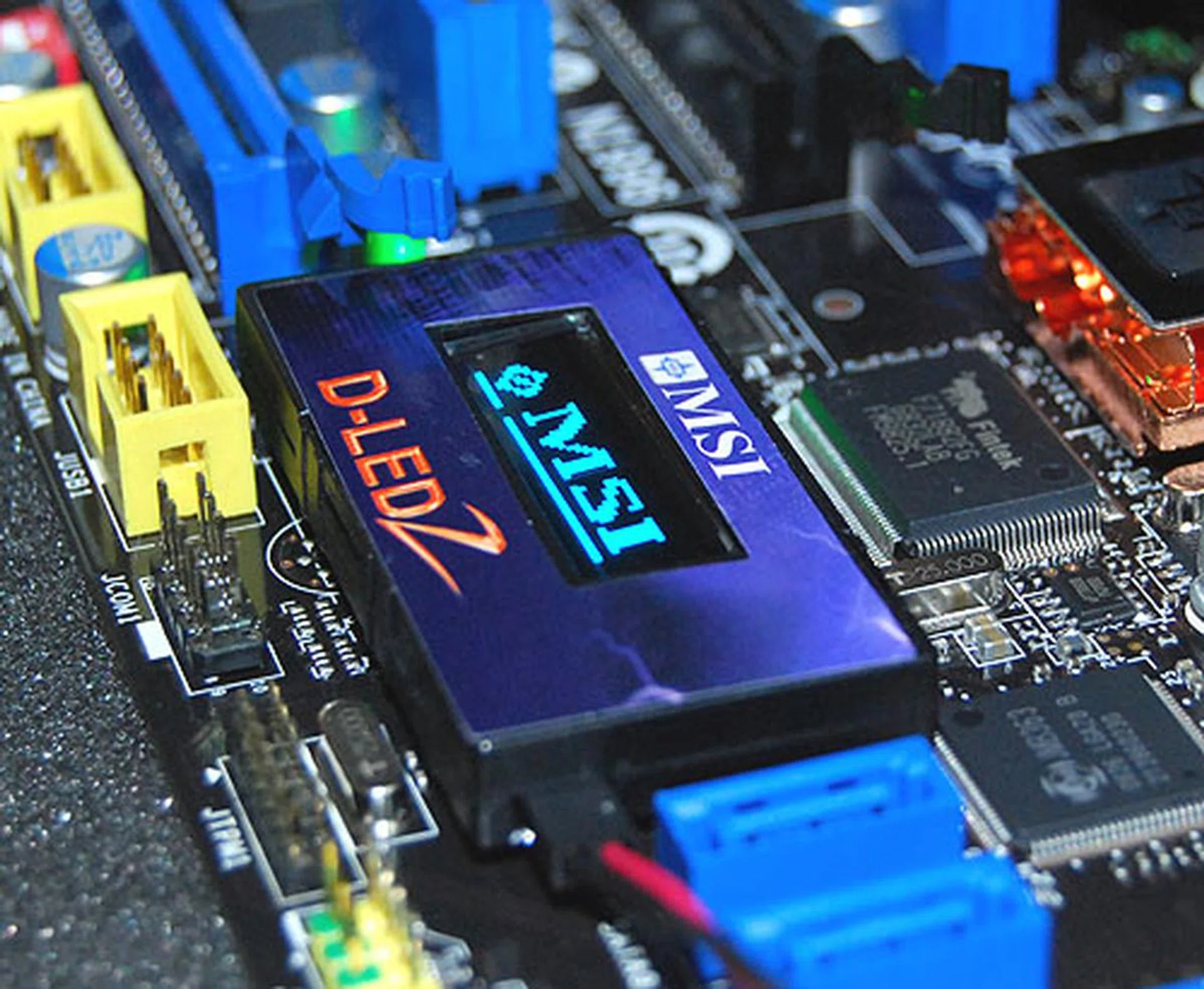 MSI also has its onboard status monitoring LED tool. It's a bit more advanced than Gigabyte's version but of course not to the extent of ASUS' LCD Poster. 