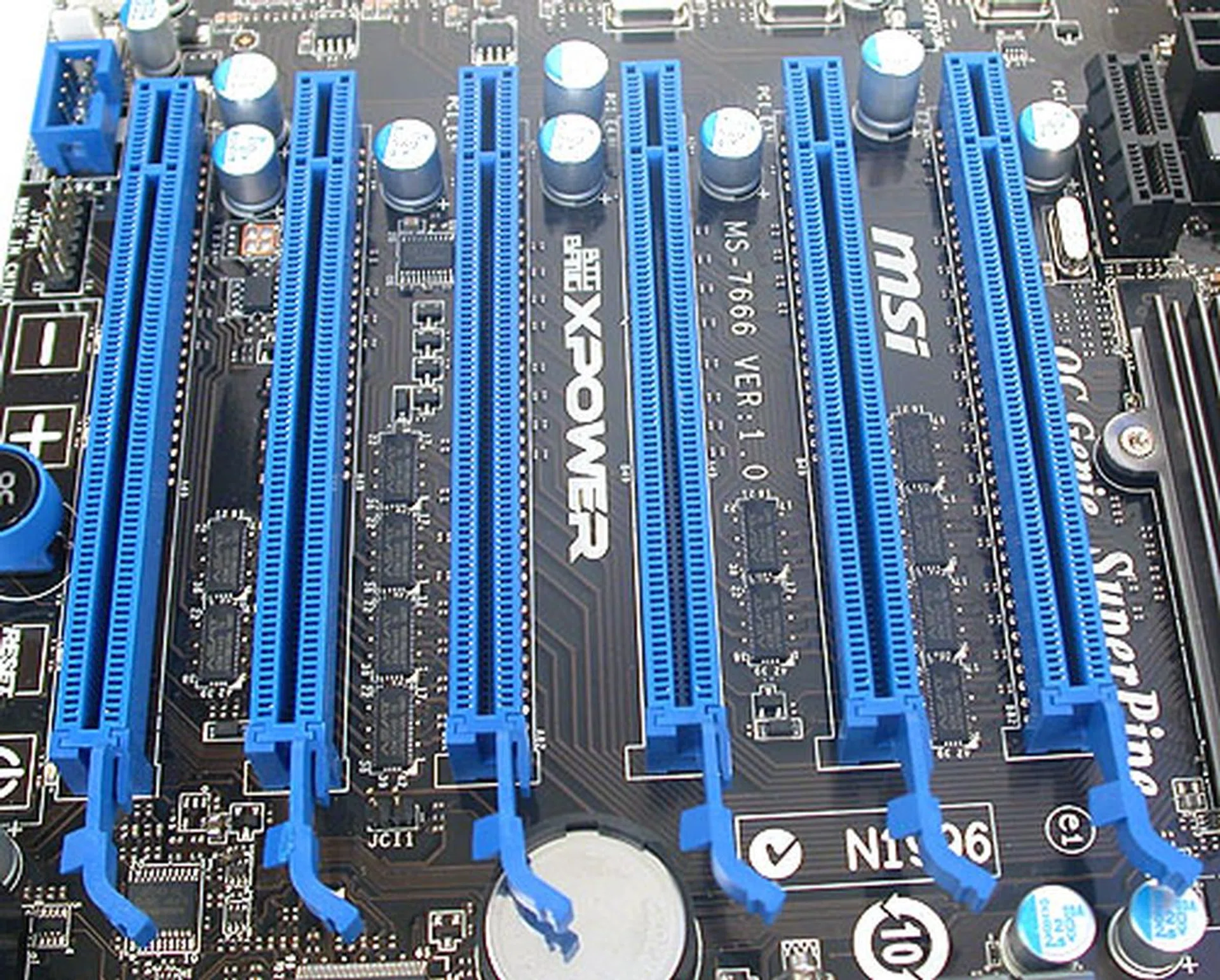 MSI has one fewer PCIe 2.0 x16 slots than Gigabyte and more critically, there's no way to install four dual-slot graphics cards, as there's not sufficient space between them. Single slot cards are fine however and the MSI can do 4-way SLI/CrossFireX. Hence the best you can outfit this board is three dual-slot graphics cards.