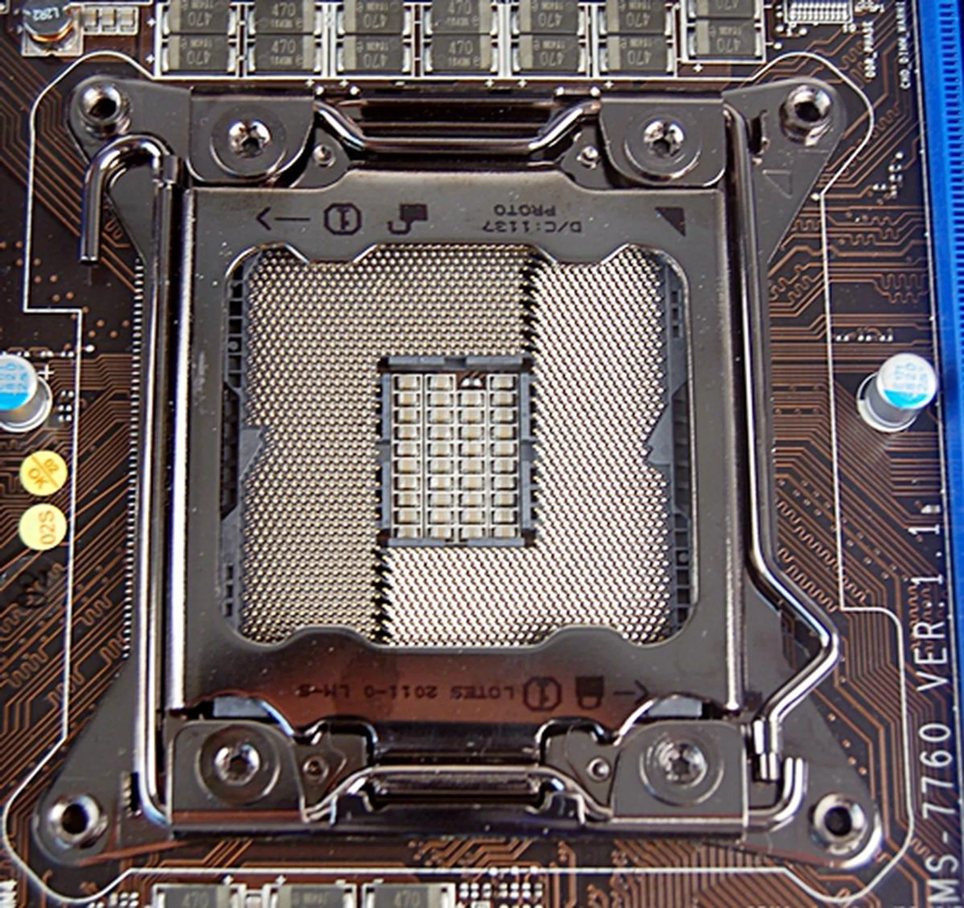 The LGA2011 CPU socket is larger than the usual CPU sockets found on consumer computing platform. This is due to the large pin count which number a mind-blogging 2,011. This is mostly the result of a quad-memory controller implementation and more power/control lines to manage this complex CPU. After all, this is a workstation-class processor. Extra caution must be exercised in mounting the Sandy Bridge-E processor as the sheer number of pins translate to higher risks of them being bent due to carelessness.