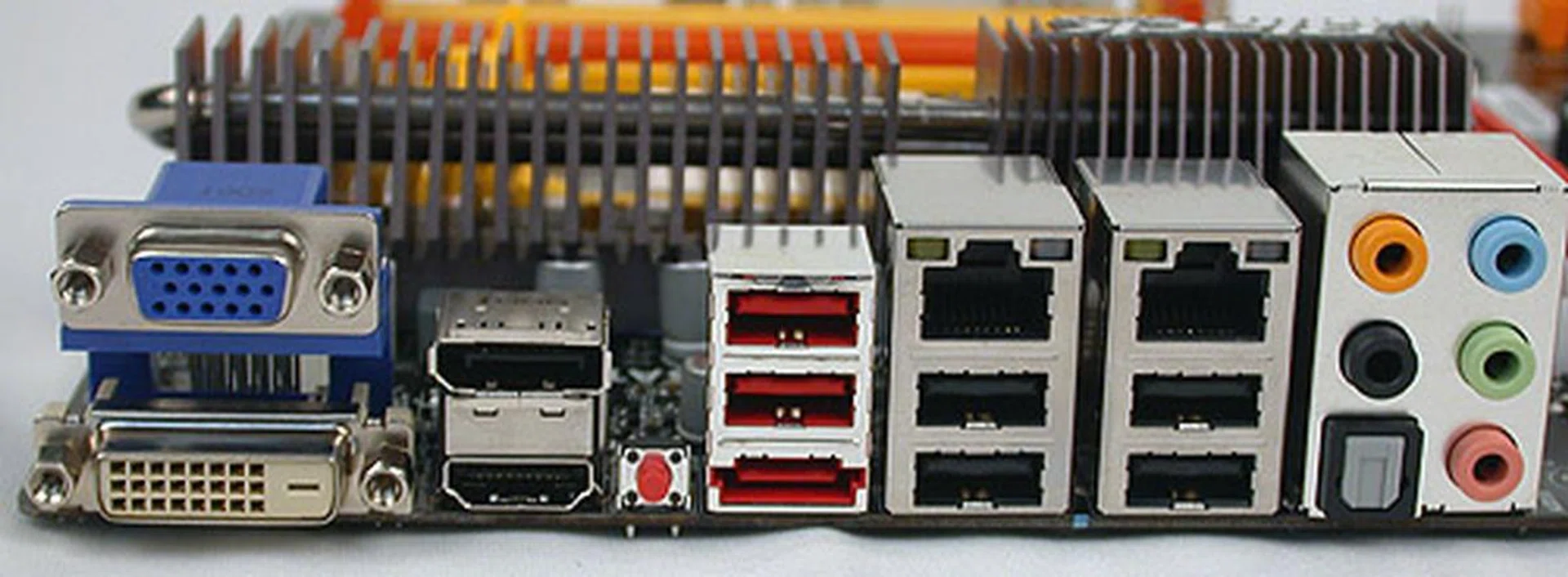 ECS has chosen to have an extra DisplayPort. This DisplayPort can work together with HDMI, DVI or analog ports at the same time but you can't use HDMI and DVI both together (the latter two share the same DVO port and there's only one supported on the chipset). The DisplayPort also shares the same signal as the first PCIe x16 slot so they cannot be used in conjunction. It also means there's no space for PS/2 ports on the rear I/O.