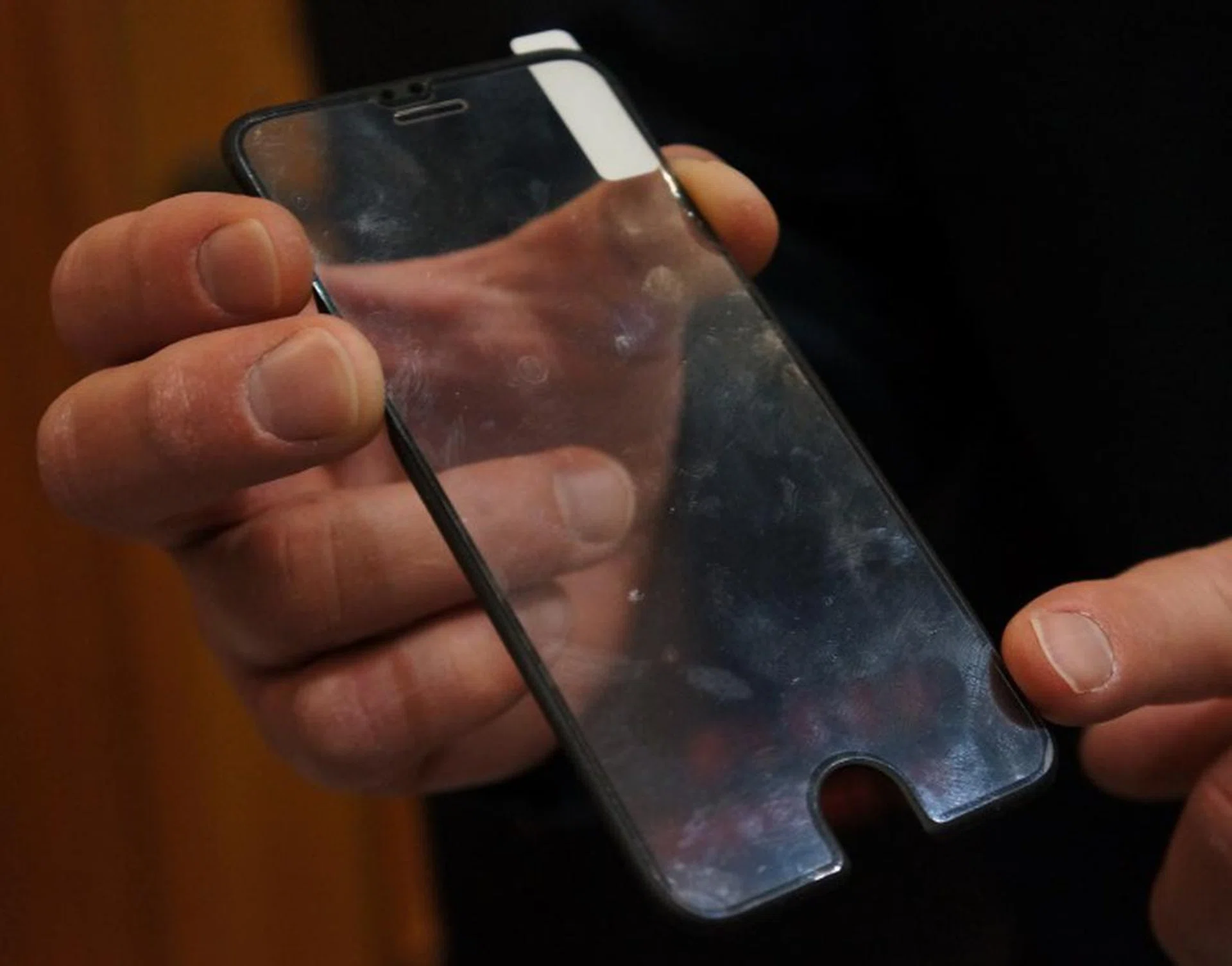 The silicon lining on the sides is how Patchwork's screen protector will thoroughly protect your phone's glass.