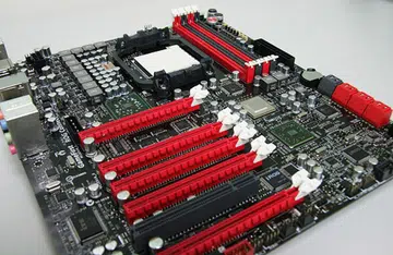 And there she is, the ASUS Crosshair IV Extreme AMD 890FX based motherboard without the cool heatsink covers on. Instead of quad PCIe x16 slots on the Formula, the Extreme goes for a total of 5.