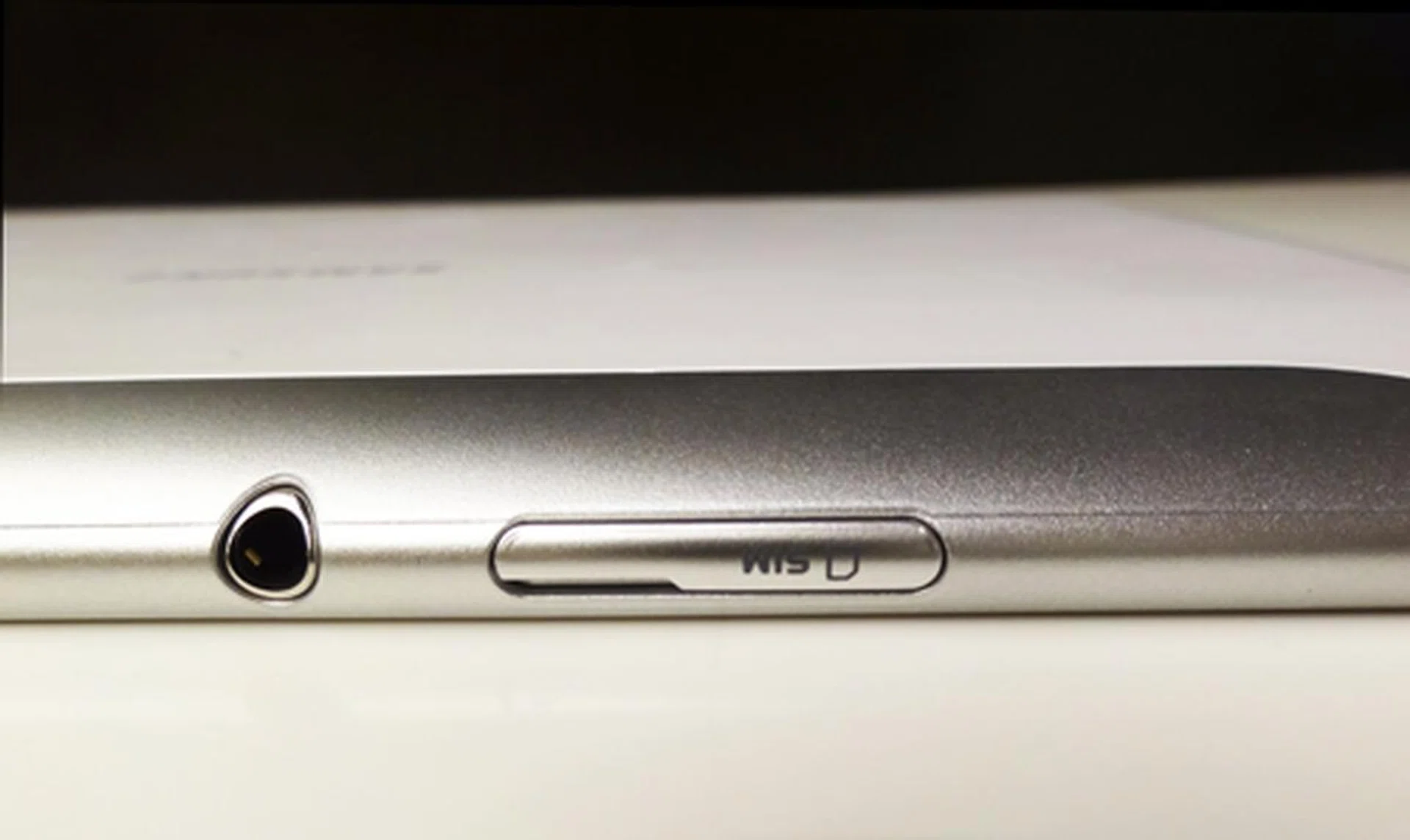 3.5mm headphone port and a micro-SIM card slot.