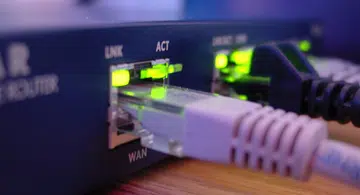 A wired Ethernet connection is still the fastest way to get onto the Internet. Image source: Tavis Online.