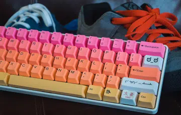 A custom mechanical keyboard. (Photo by <a href="https://unsplash.com/@pinjasaur?utm_source=unsplash&utm_medium=referral&utm_content=creditCopyText">Paul Esch-Laurent</a> on <a href="https://unsplash.com/s/photos/mechanical-keyboard?utm_source=unsplash&utm_medium=referral&utm_content=creditCopyText">Unsplash</a>)