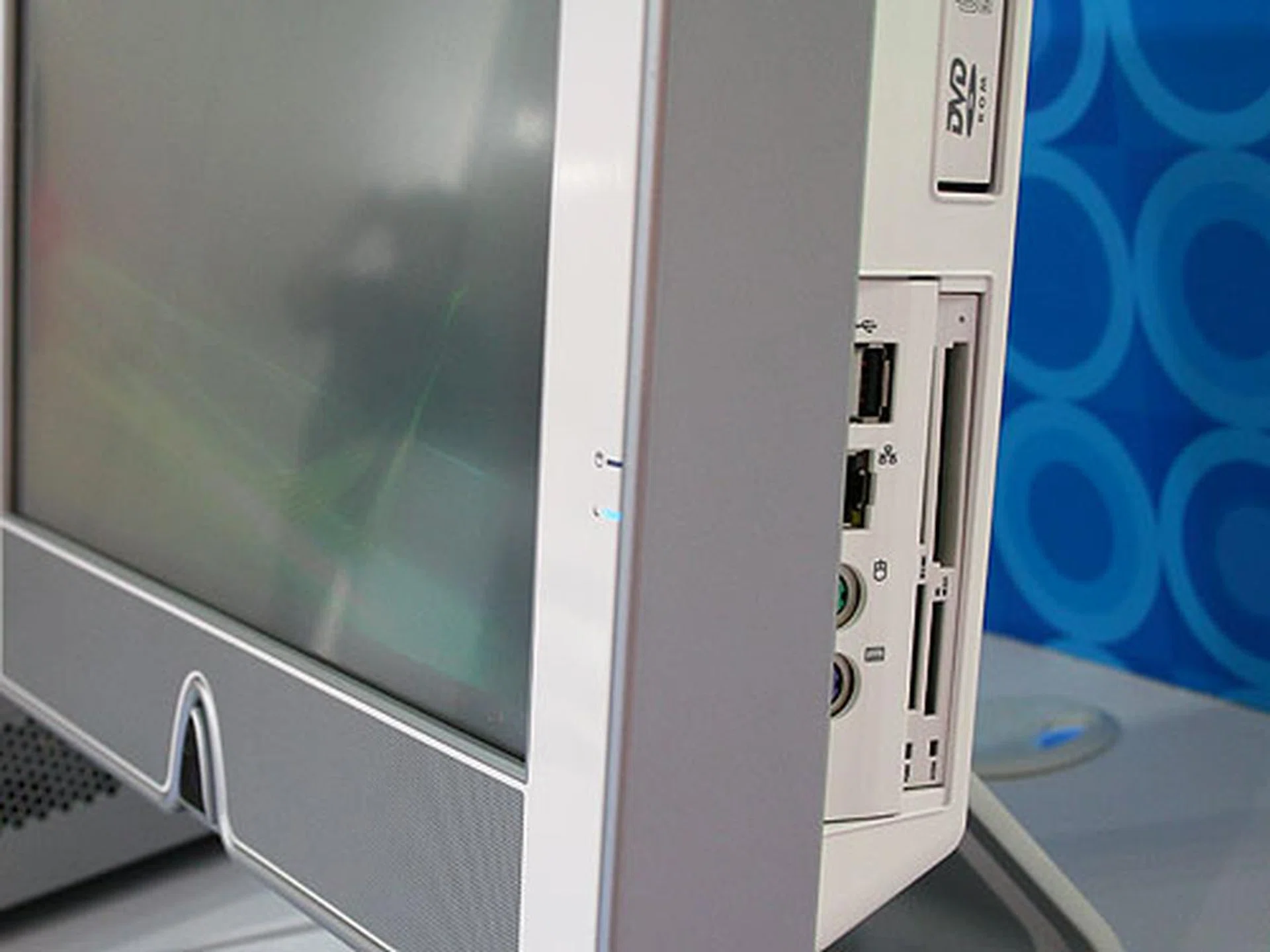  On the right side of the display, you'll find the optical drive and your typical USB, LAN, PS/2 keyboard/mouse and a multi-card reader.  