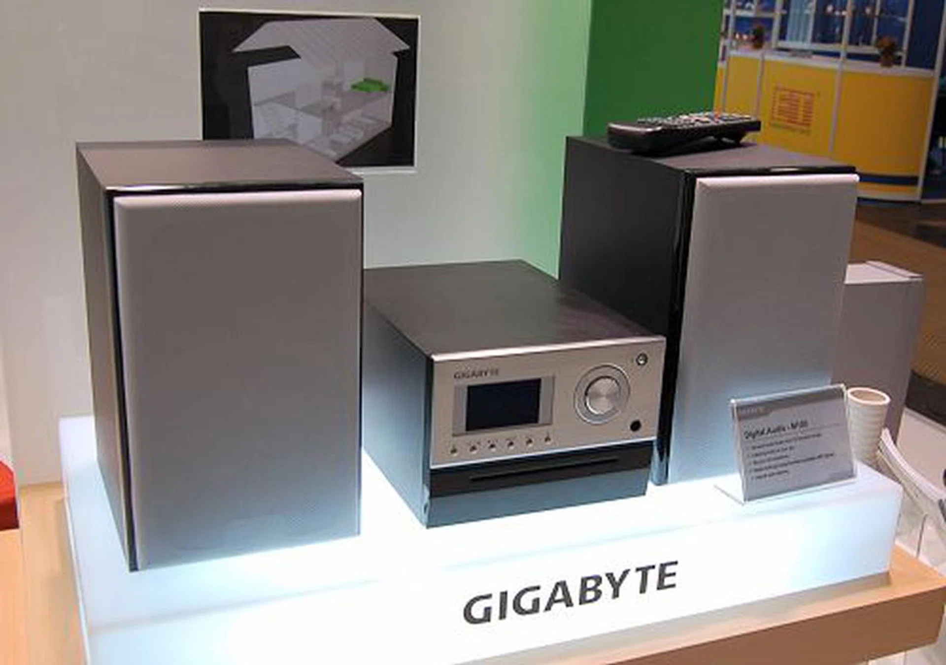  The Gigabyte M100 digital audio unit looks somewhat like an SFF unit, but it is more of an appliance than a PC. The M100 is your personal jukebox capable of storing thousands of songs on its 80GB HDD, has an AM/FM tuner built-in and WLAN support to search and obtain more music as well as listen to Internet radio. A remote is provided but speakers however are sold separately.  