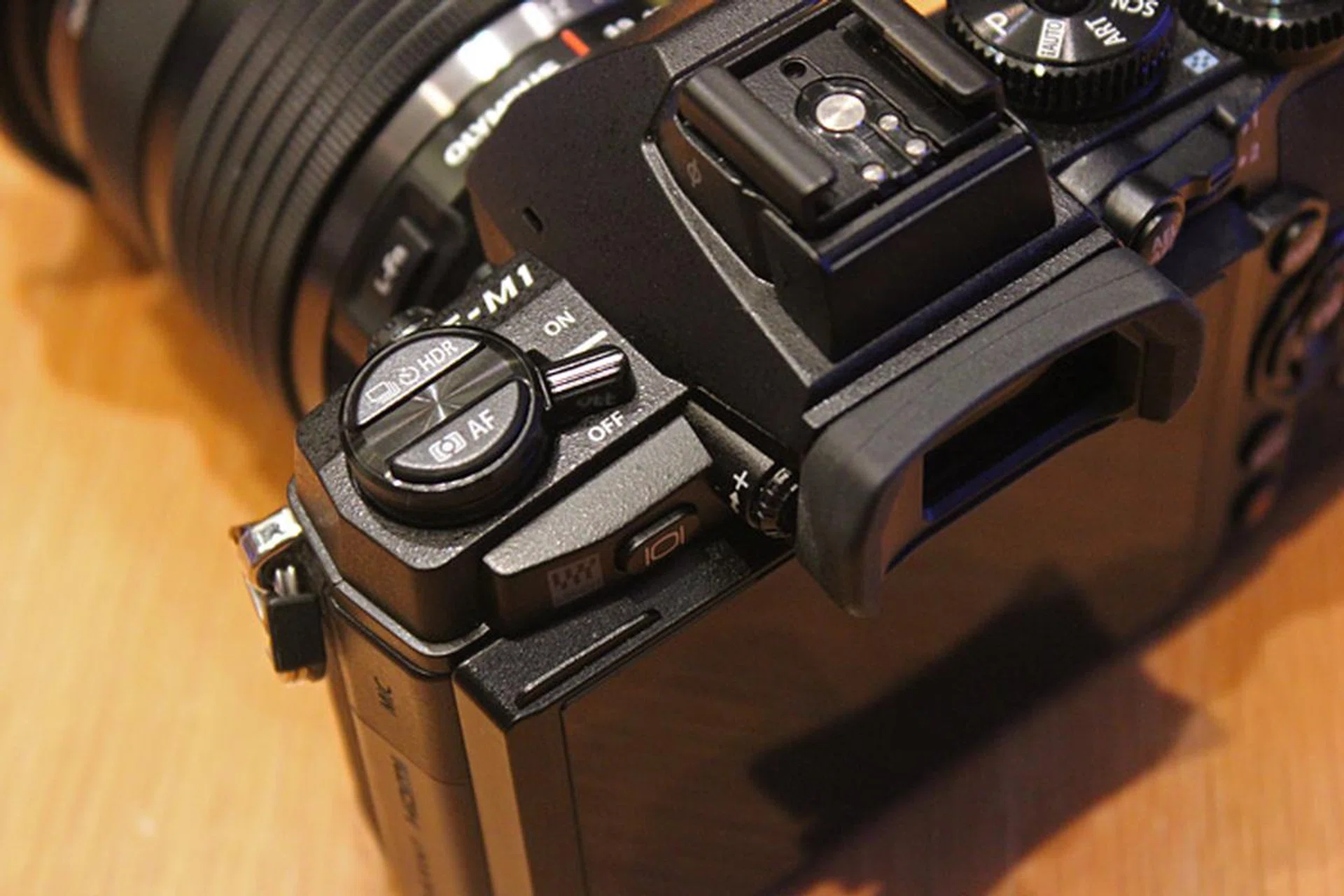 The On/Off switch has moved to a rather awkward place on the top left, instead of on the back where it was on the E-M5.