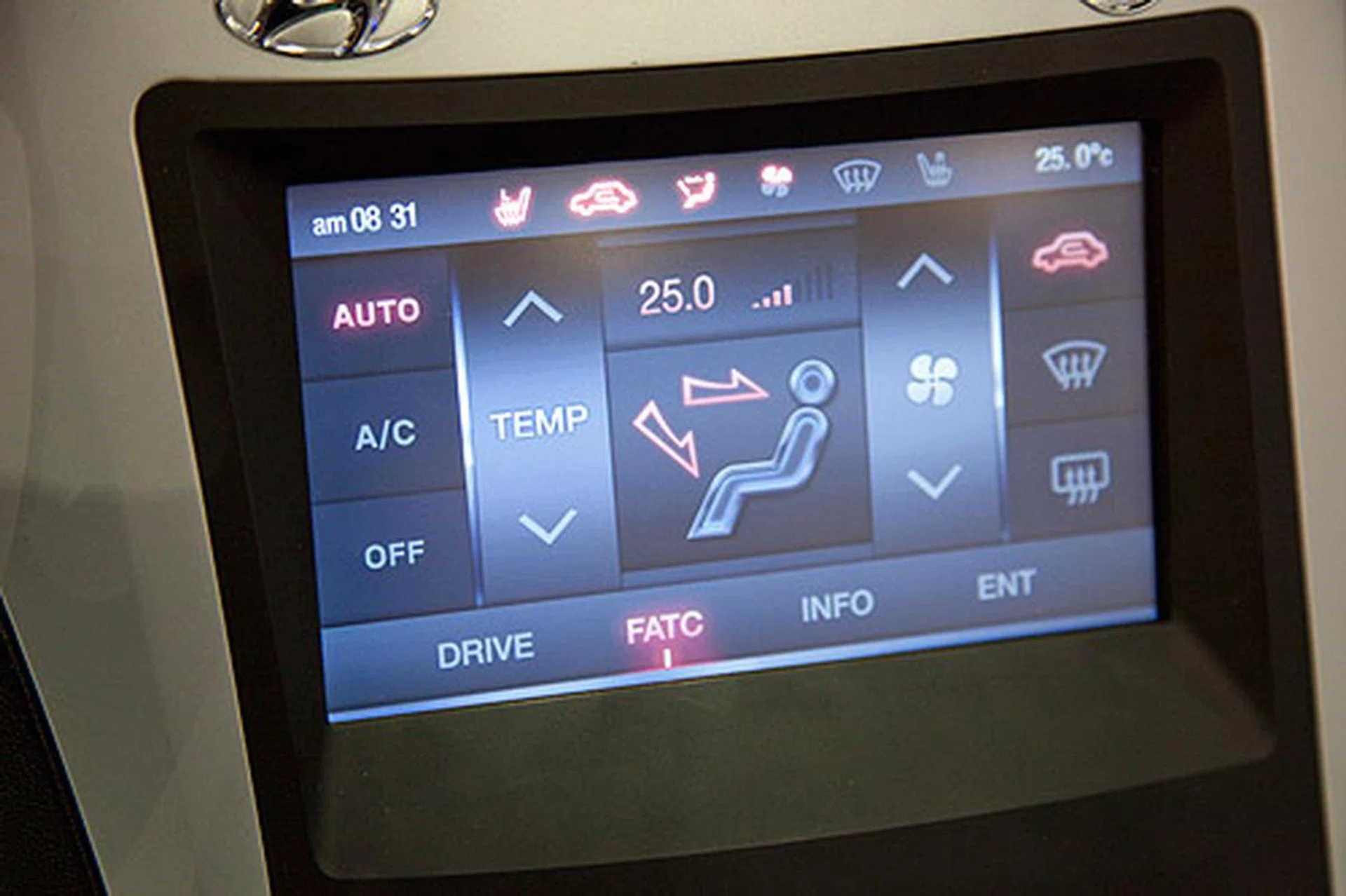 The haptic display screen lets you control the car's air conditioning, temperature and even your music selection.