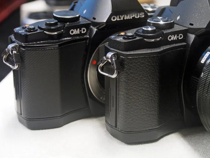 The new OM-D E-M5 Pro Kit (right) sports a leather-like design on the grip.