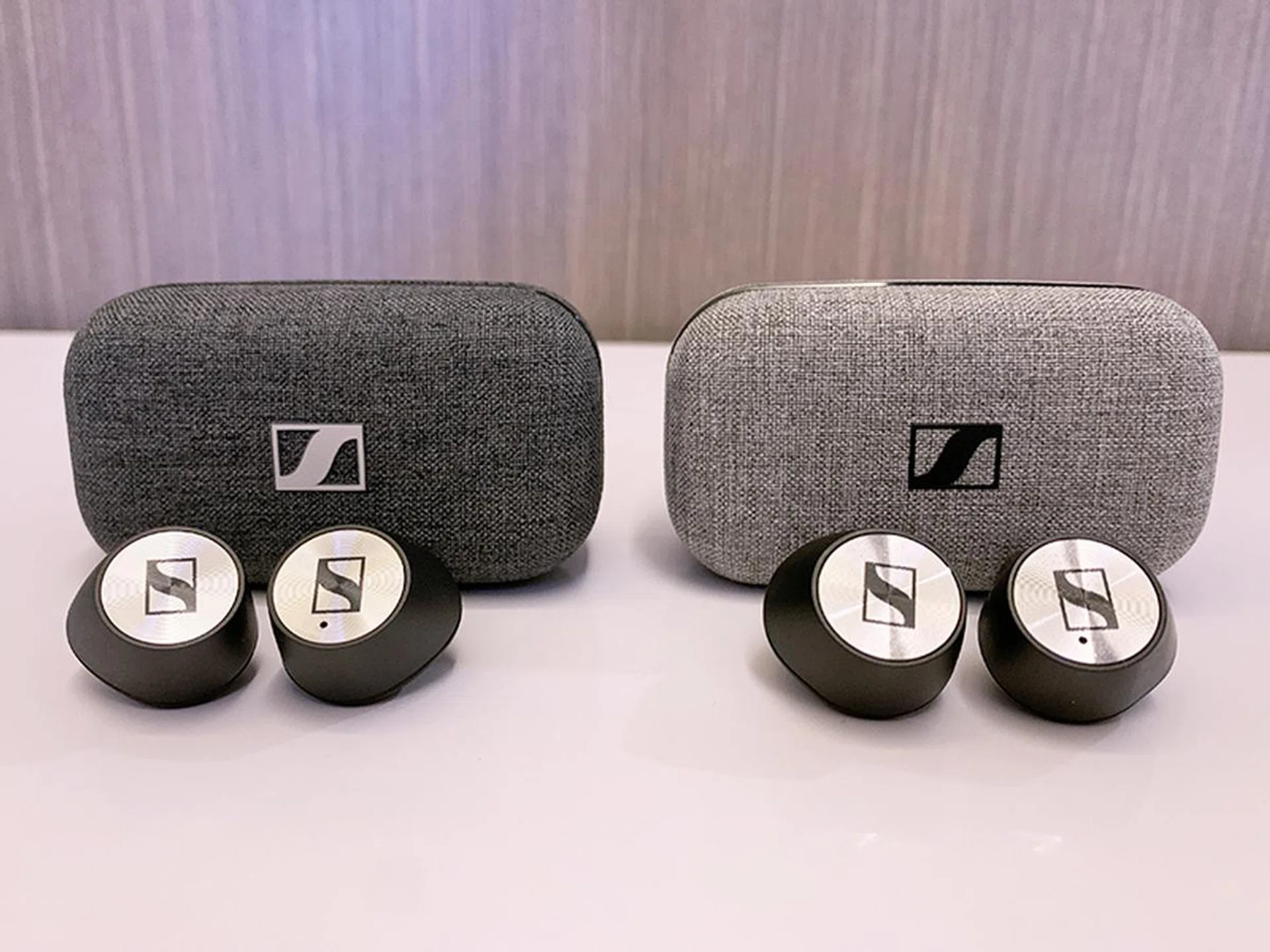 The Momentum True Wireless 2 (in dark grey on the left) looks virtually identical to its predecessor.