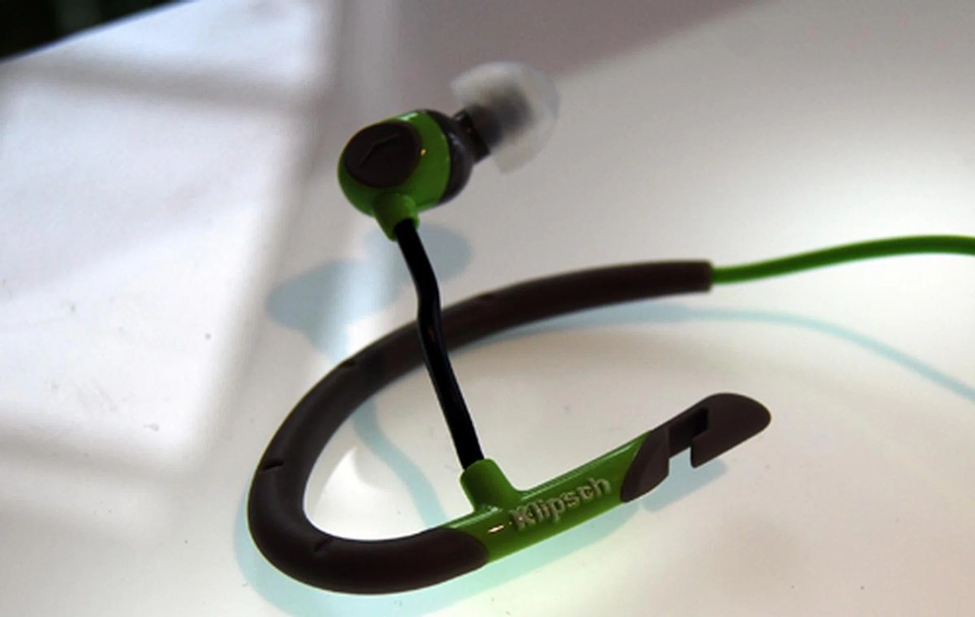 In this shot you can the the bendable arm for the ear-bud of the A5i which can be used to adjust fit.