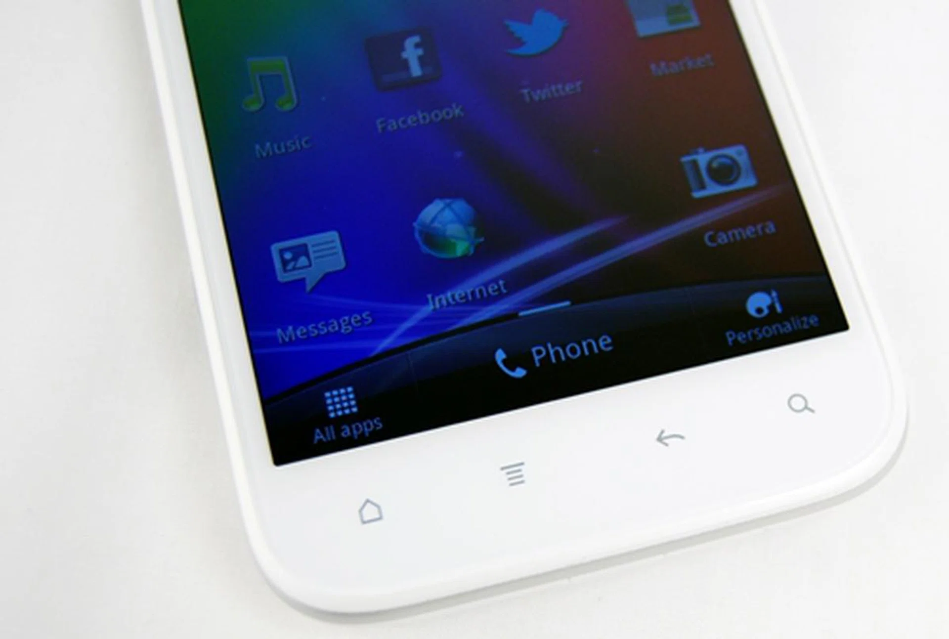 The standard four navigation touch buttons (Home, Menu, Back and Search) are located just below the display. Unlike the red glow on the keys of the Sensation XE, the keys on the Sensation XL have a faint white glow.