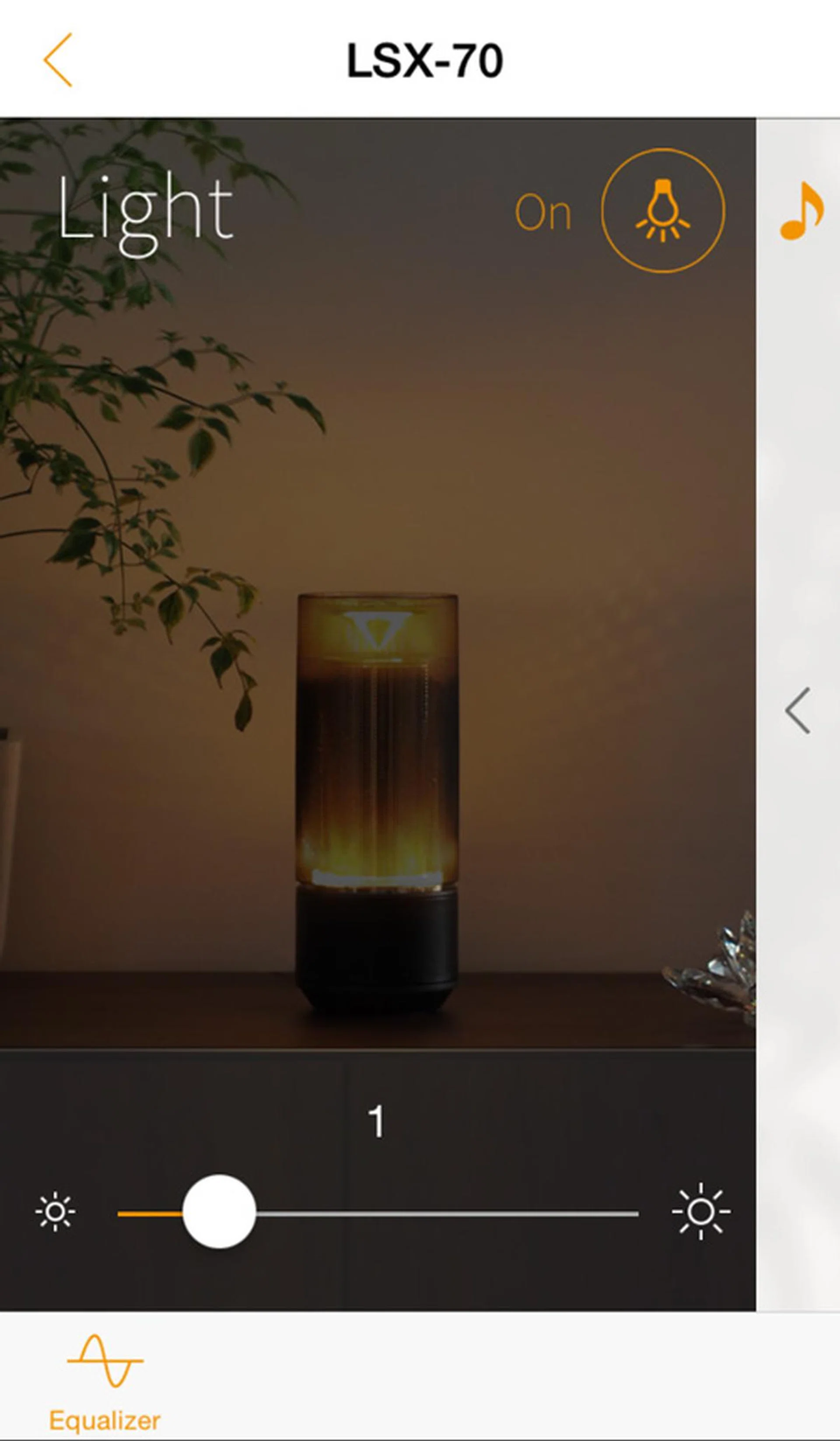 The DTA controller has a drawer-style interface to let you switch between controlling the light and the speaker,