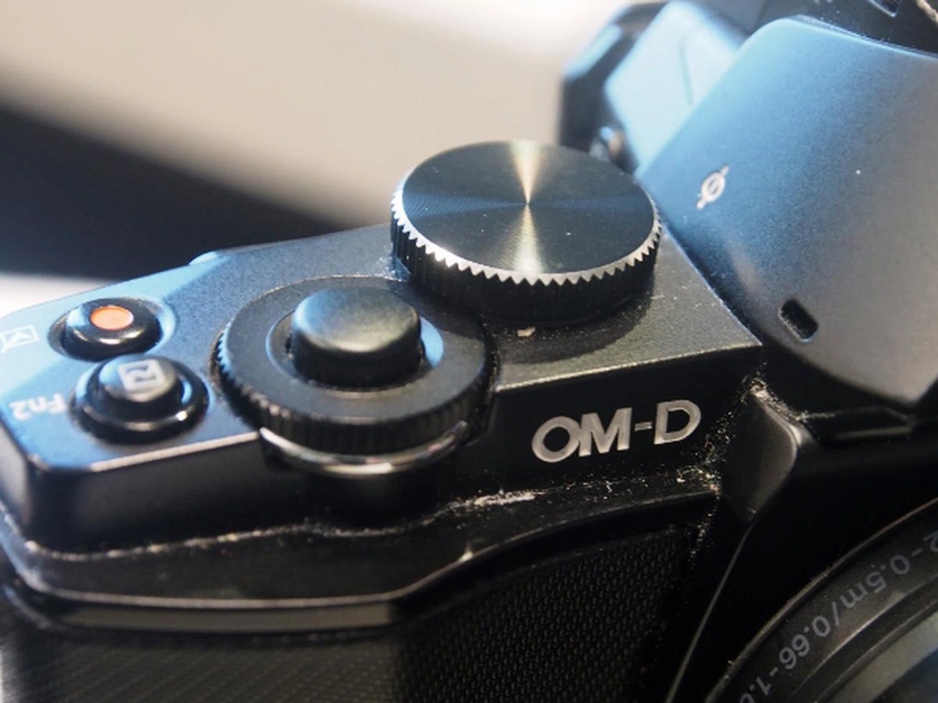 The E-M10 features twin control dials that are raised higher compared to those found on the E-M5, as well as a larger shutter release button. 