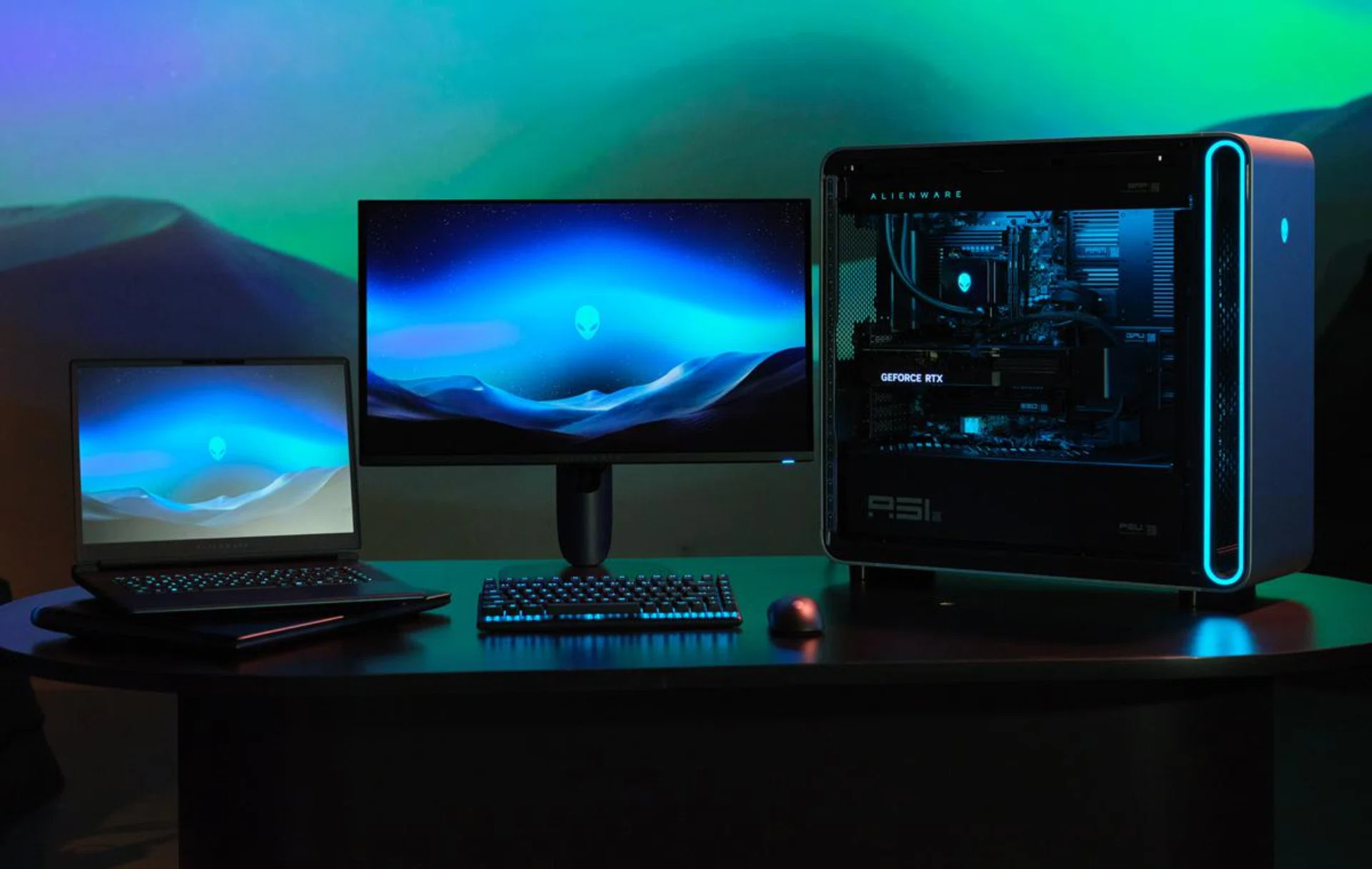 Alienware Area-51 laptop, 27-inch 4K QD-OLED gaming monitor and Area-51 desktop. This is someone's downpayment for a car loan on a table. Photo: Dell.