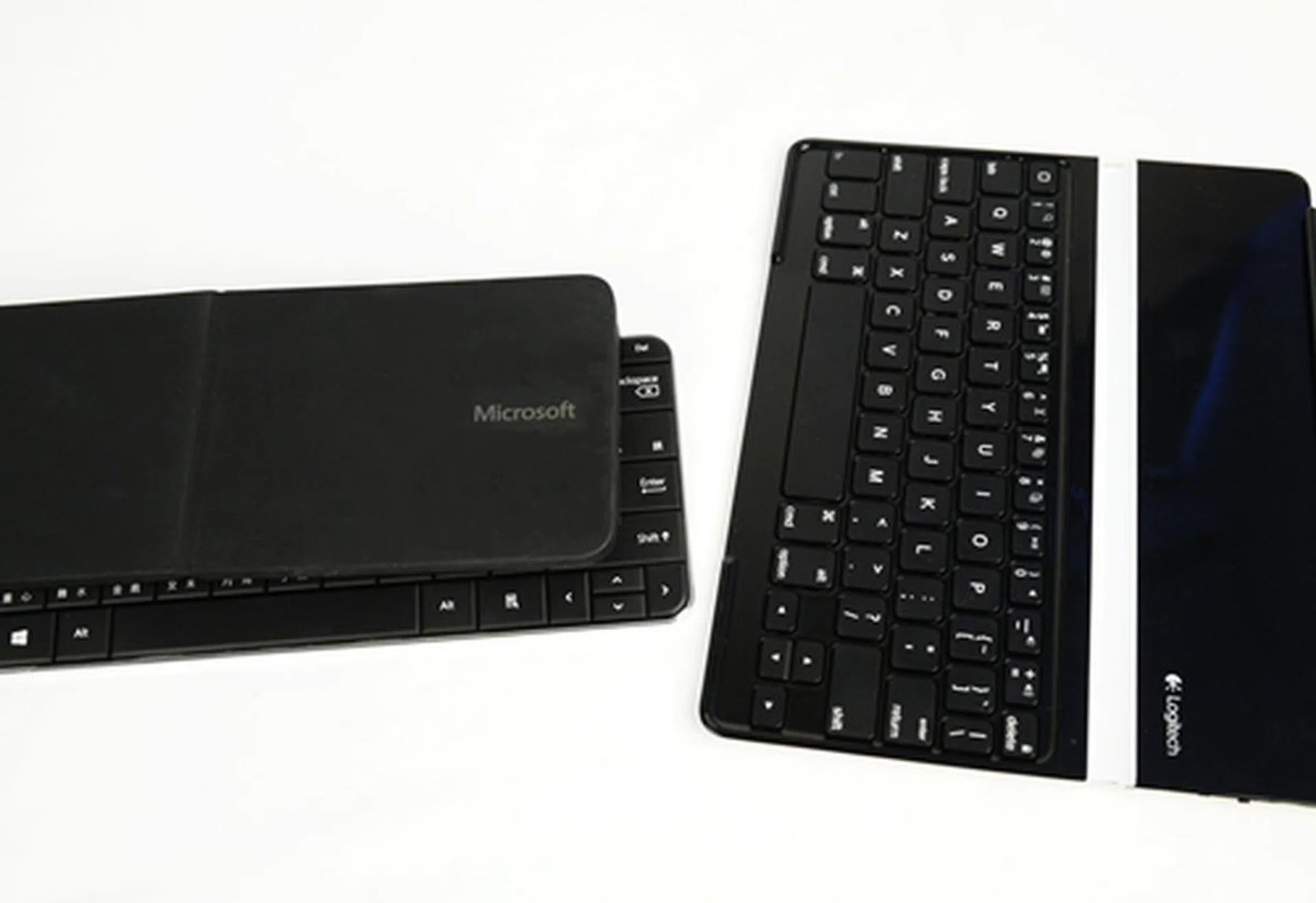Both the Microsoft Wedge Mobile Keyboard and the Logitech Ultrathin Keyboard Cover are great accessories catered for different needs. So choose wisely based on personal expectations.