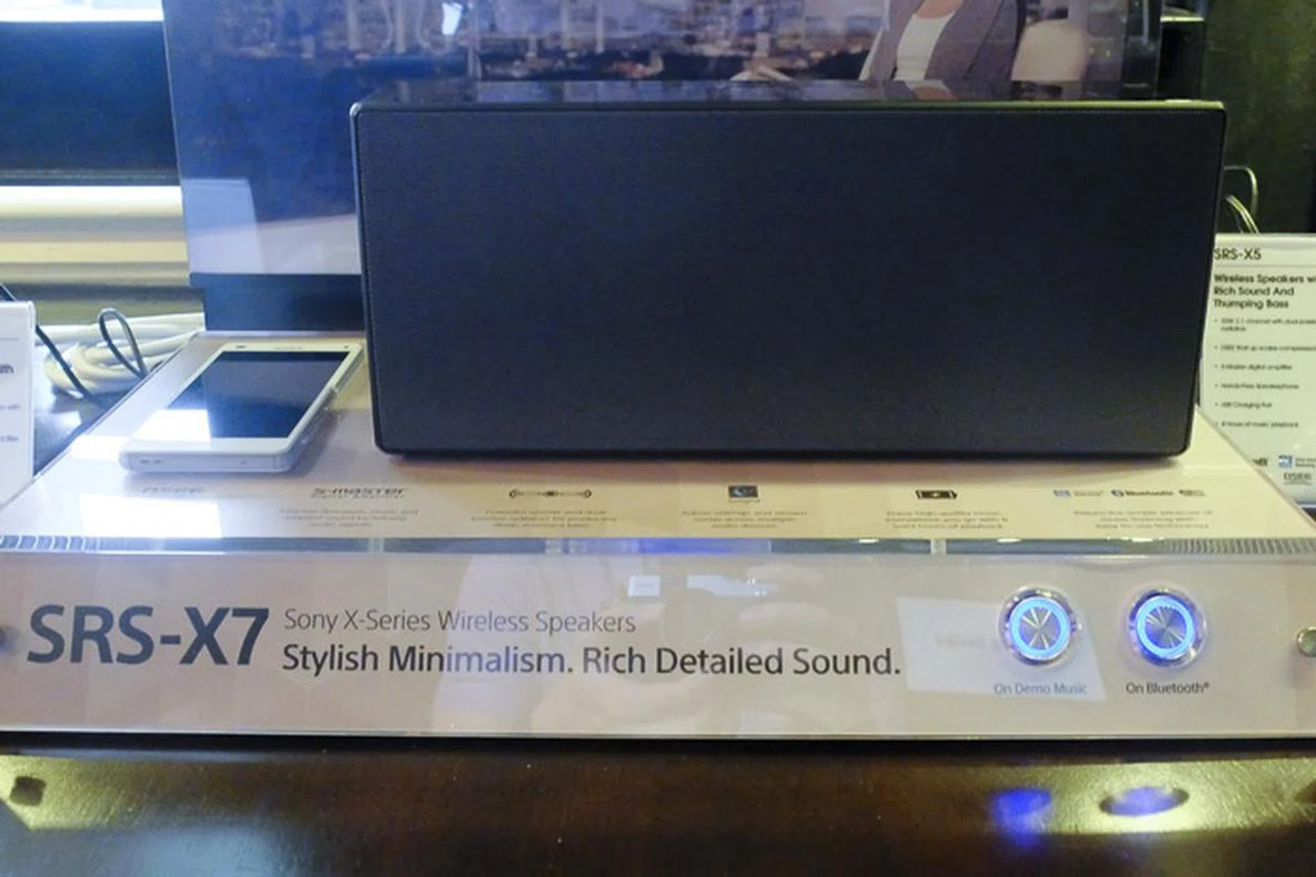 The larger size of the SRS-X7 becomes more evident when you consider the relative size of the mobile phone beside it.