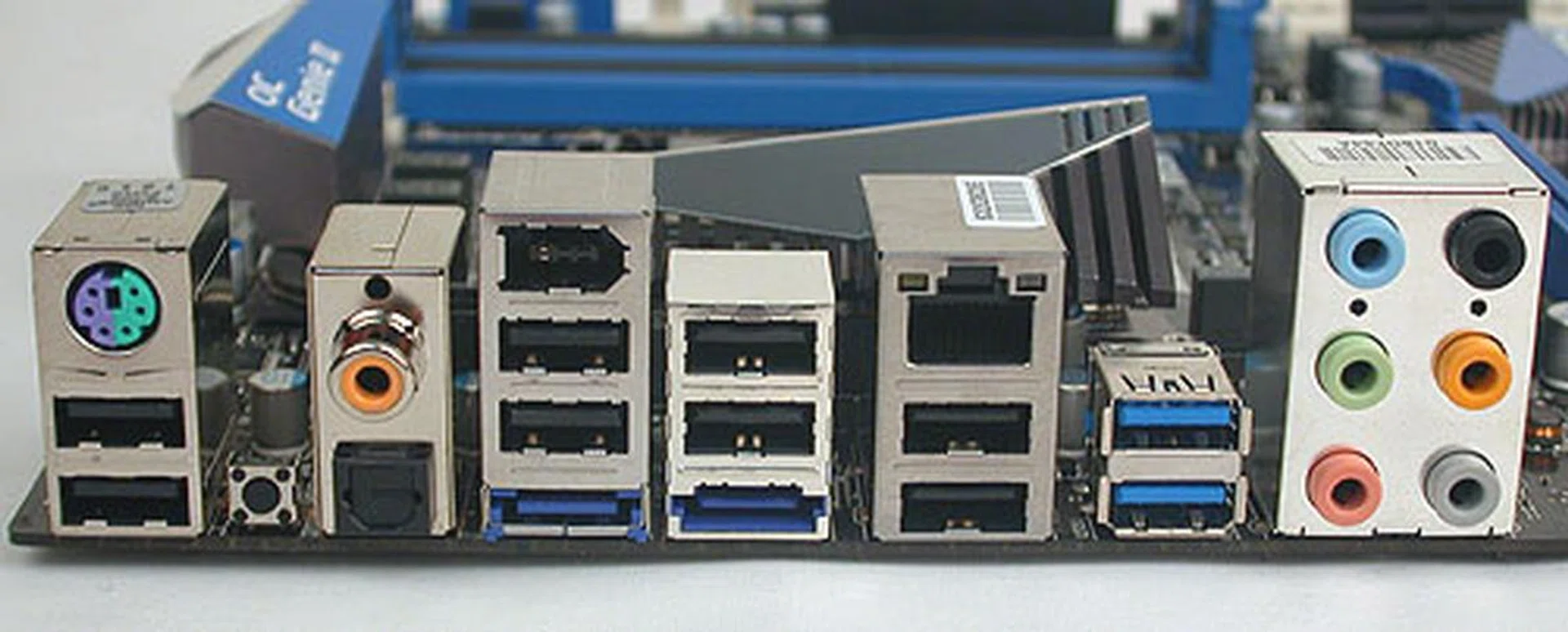 FireWire remains on this MSI board, but you do get two USB 3.0 ports (blue) and both optical and coaxial S/PDIF. A Clear CMOS button is much required and only a single Gigabit connector signals its more mainstream positioning.