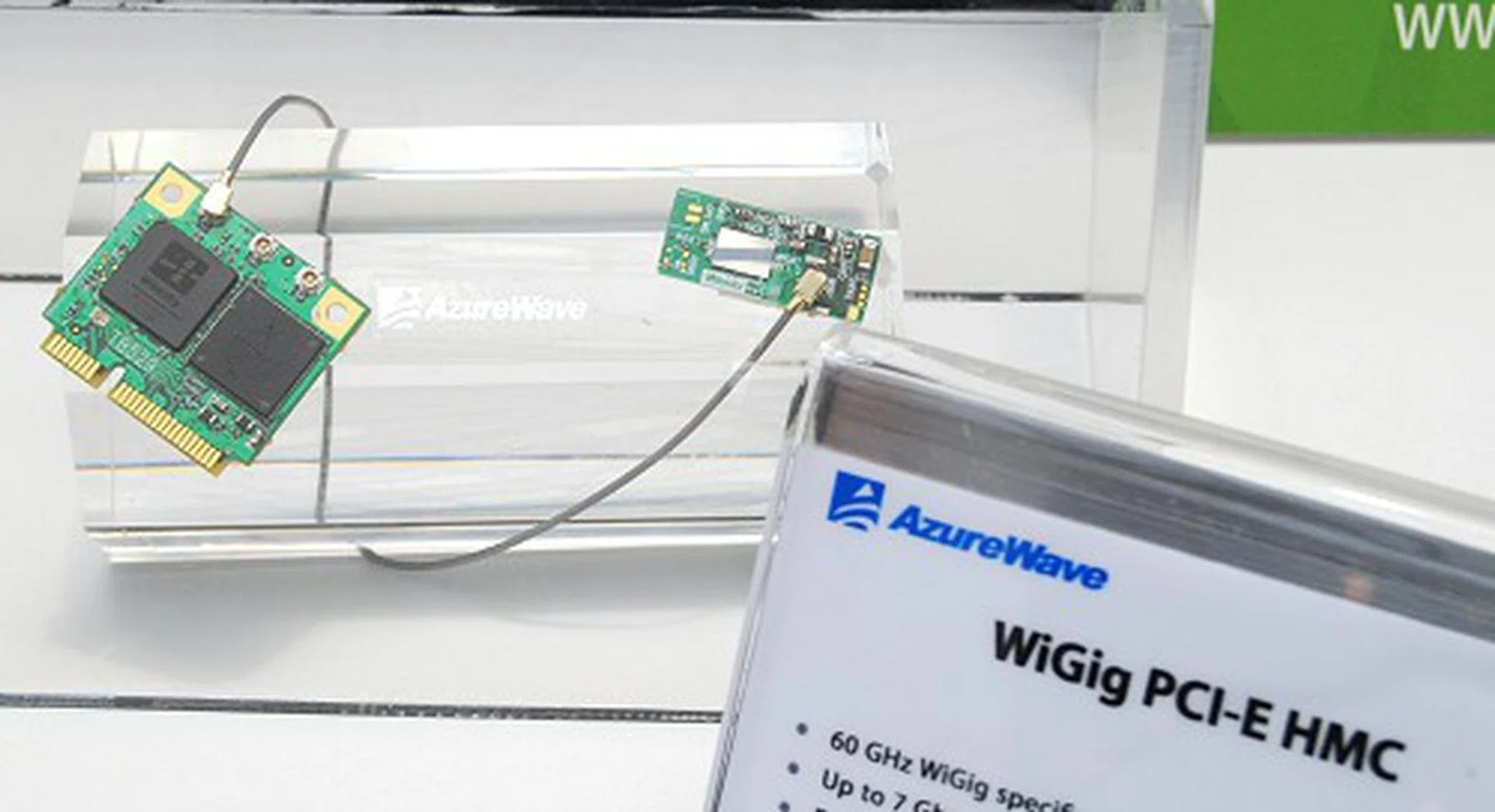 And here she is - the world's first WiGig PCIe device. Its maximum transmission throughput is up to 7Gbps! Looking like any other wireless solution in appearances, this extremely high transmission rate is possible thanks to the new 60GHz operational spectrum in addition to simultaneously working on the 2.4GHz and the 5GHz bands. Tri-band Wi-Fi anyone? We surely like the sound of that and probably saying good riddance to wired networking for the masses.